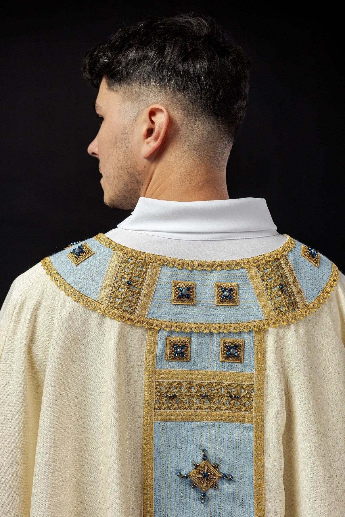 Marian chasuble, front detail of blue orphrey with gold diamond embroidery and natural stones