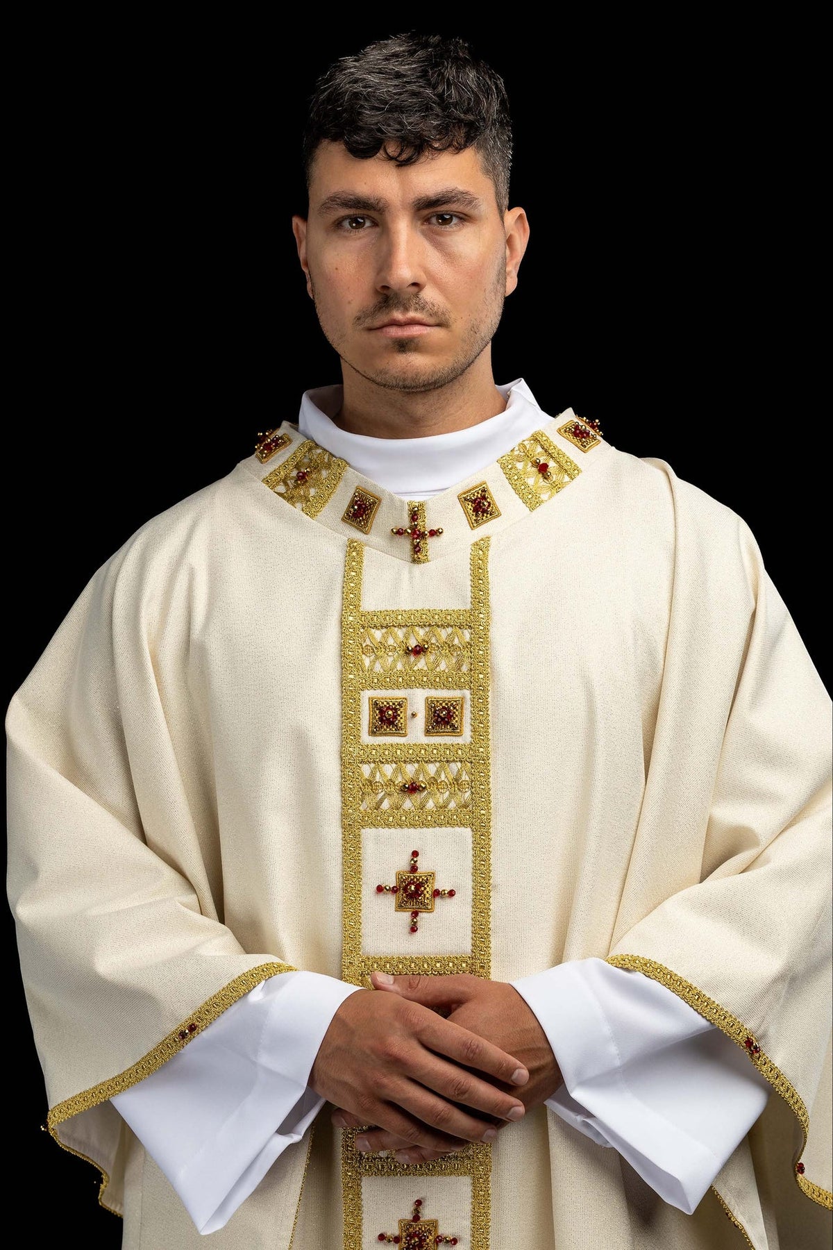 Handcrafted Chasuble with Natural Stones, Handmade 7005 worn front view in ivory with gold trim and red stones