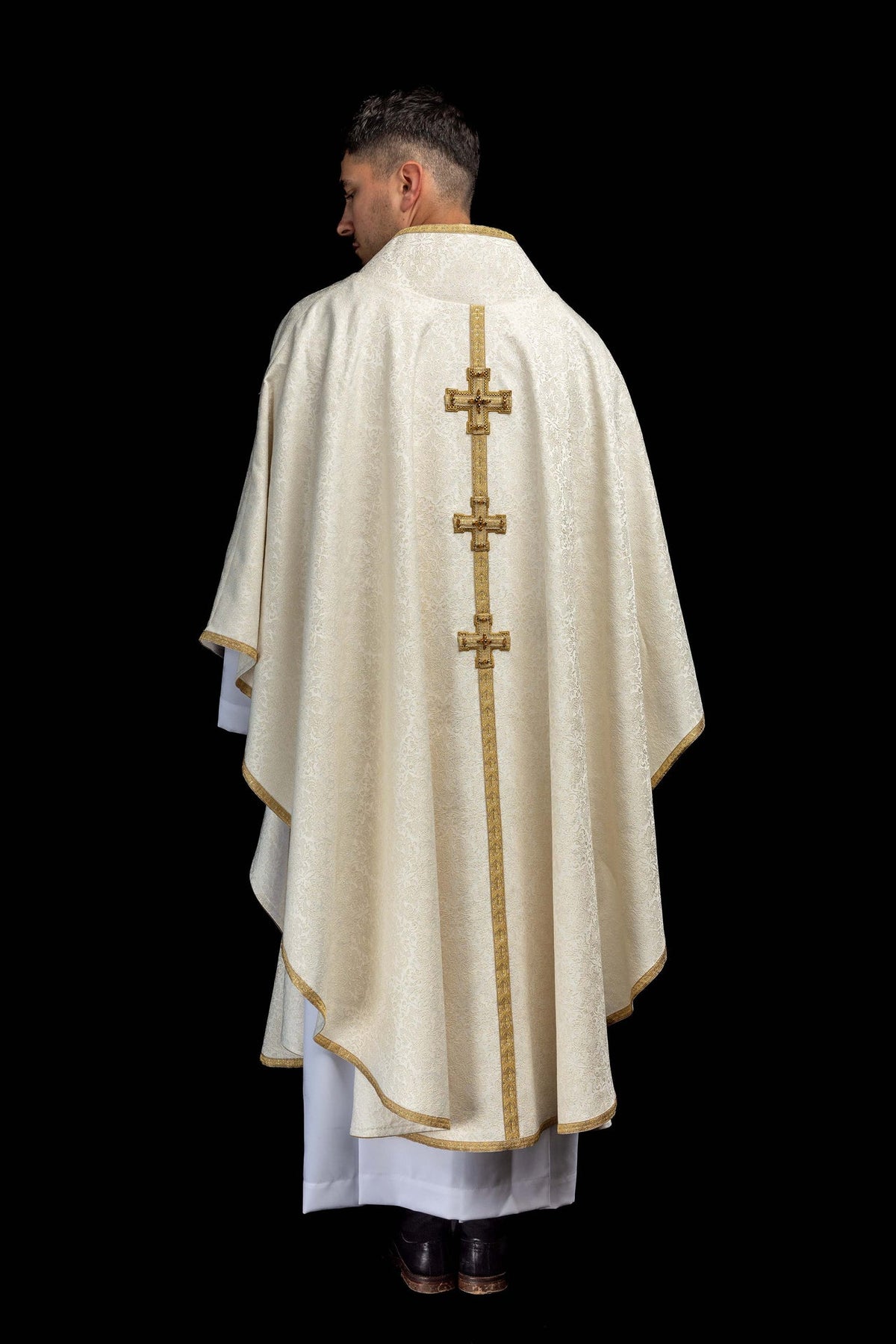 Handcrafted chasuble with natural stones, ivory back with gold trim and three crosses