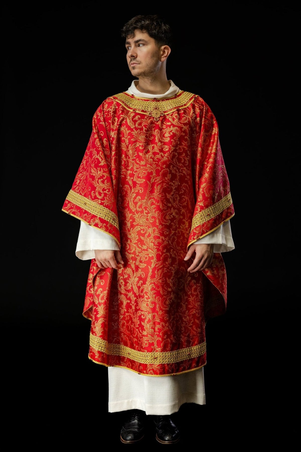 Red chasuble, full front view with gold floral jacquard fabric and trim