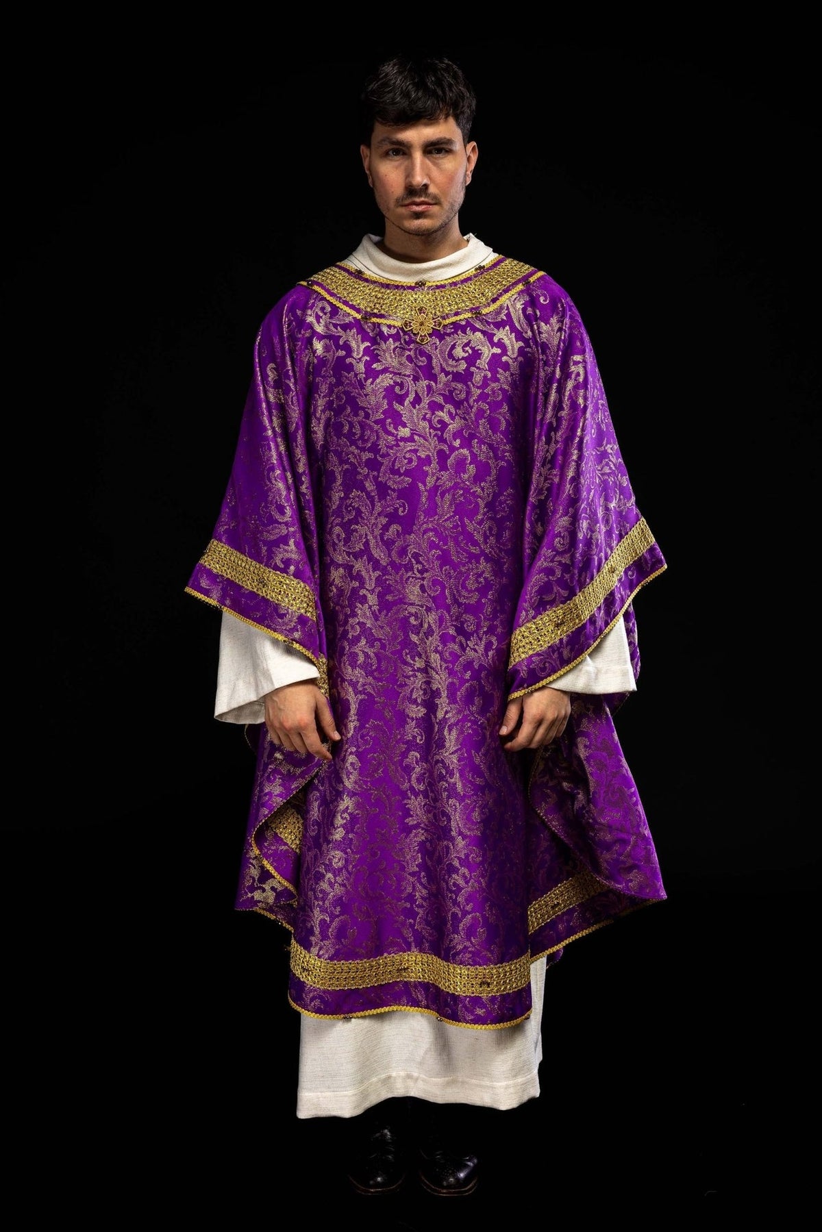 Purple chasuble, full front view with gold floral jacquard fabric and trim