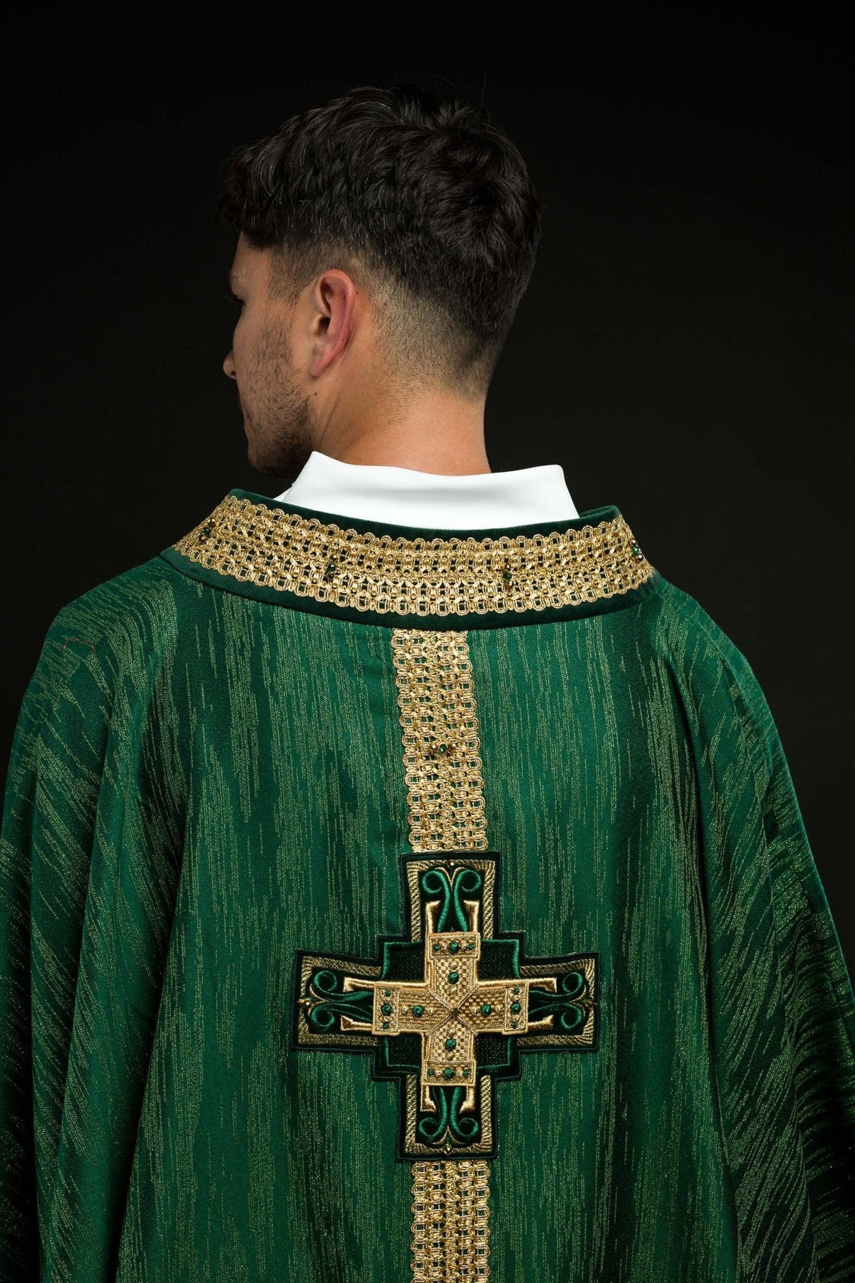 Green chasuble back view with gold cross embroidery and neckline trim