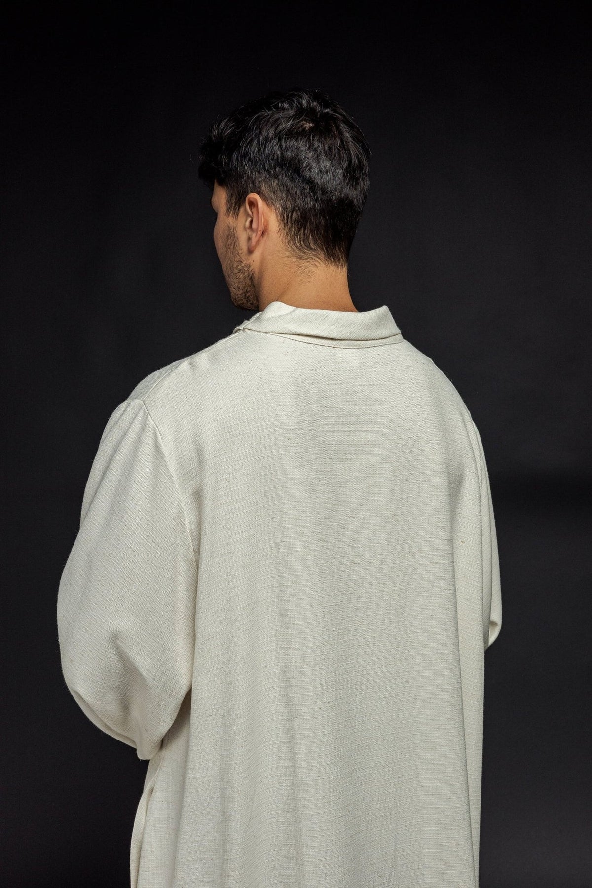 Linen priest alb in ecru, back close-up showing collar and natural-weave fabric
