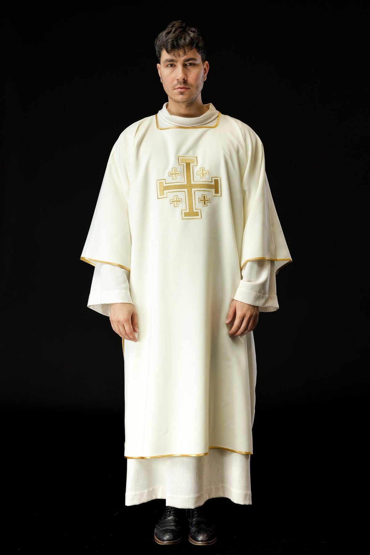 Ecru dalmatic front view with embroidered gold cross