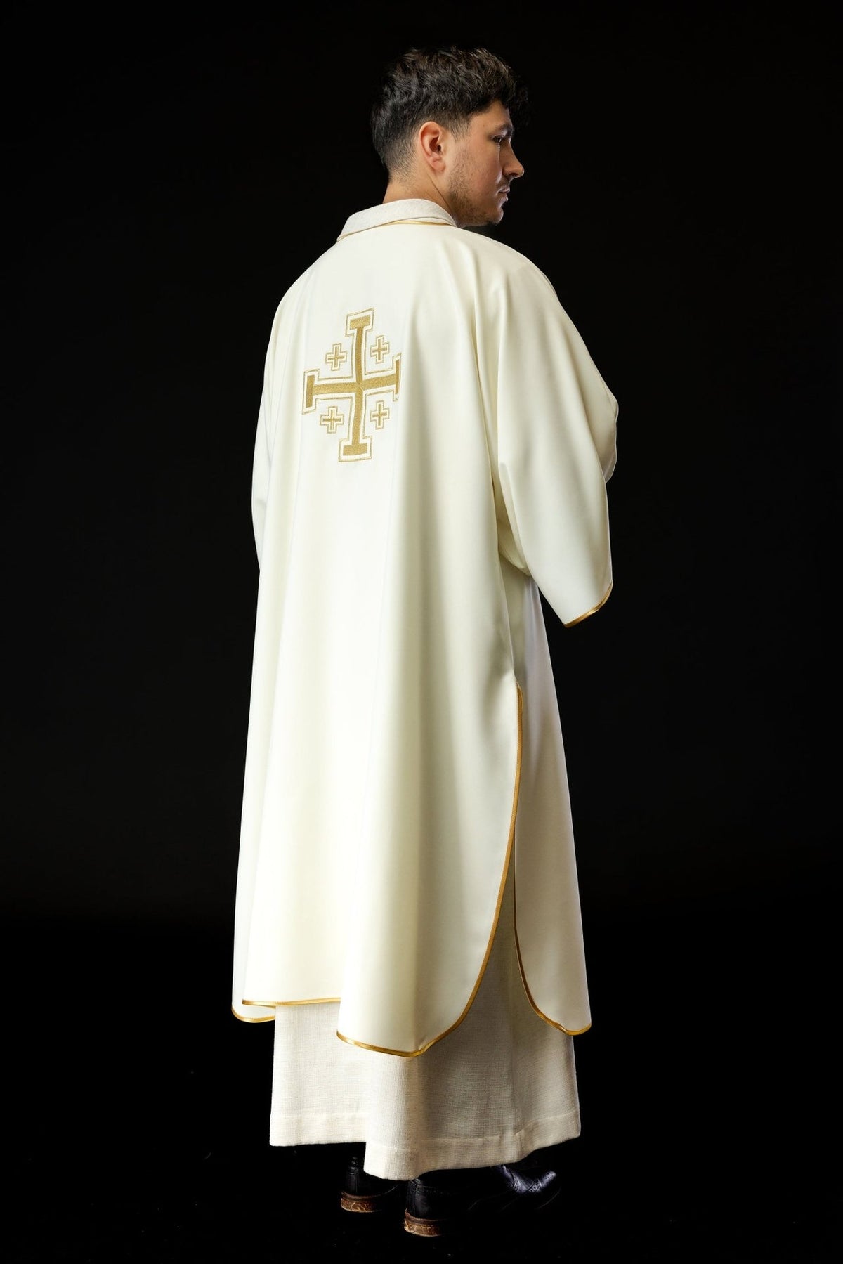 Ecru dalmatic side back view with gold-trimmed edges
