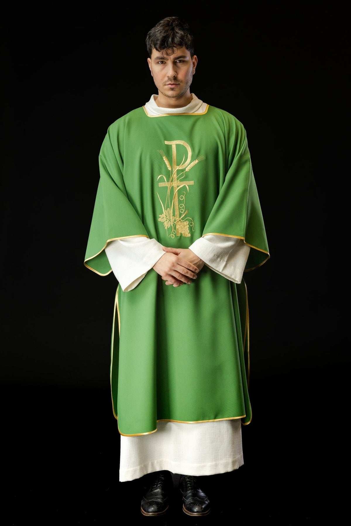 Green dalmatic, full front view with gold trim and central PAX cross embroidery