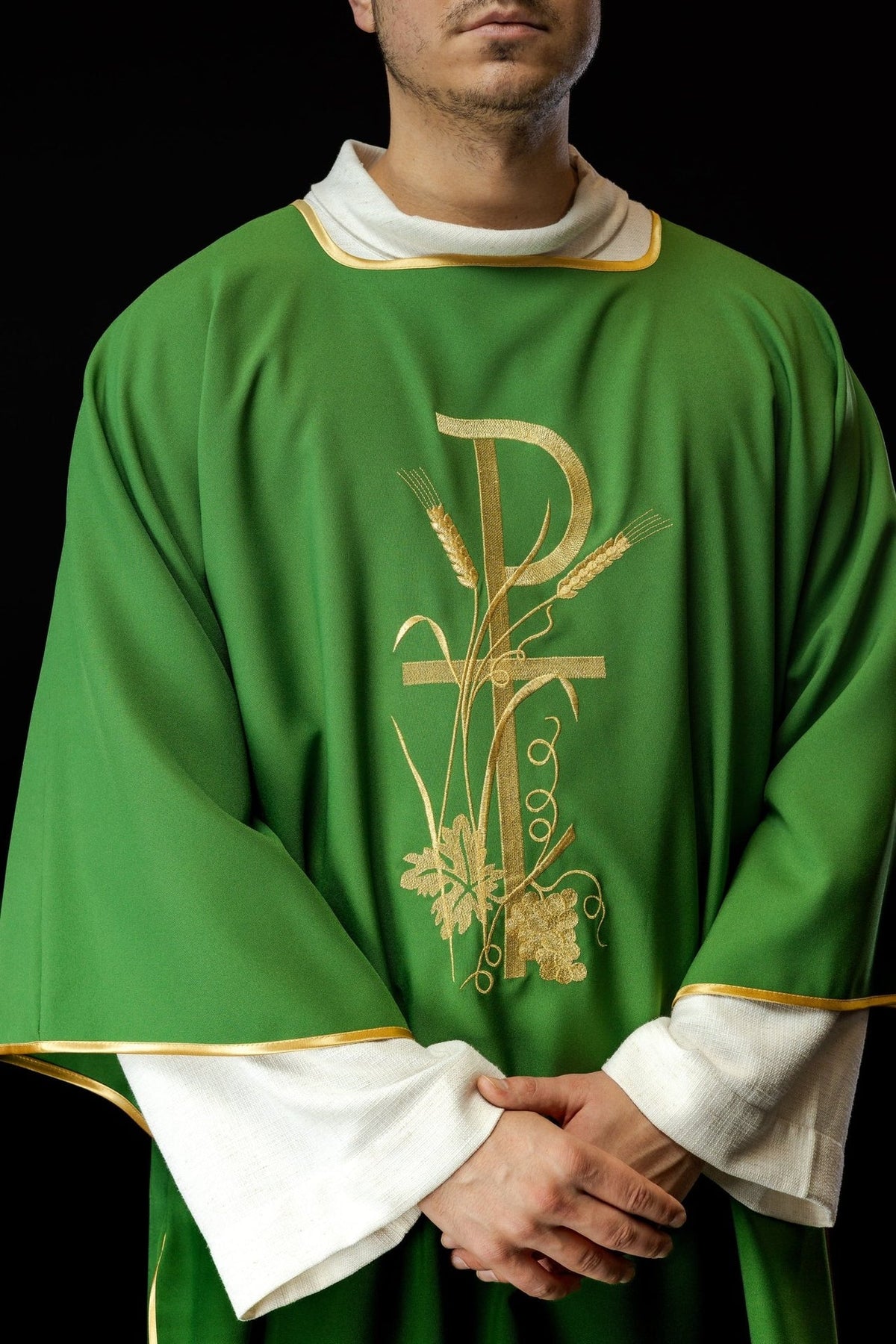 Green dalmatic, front close-up showing gold PAX cross, wheat, grapes and gold trim