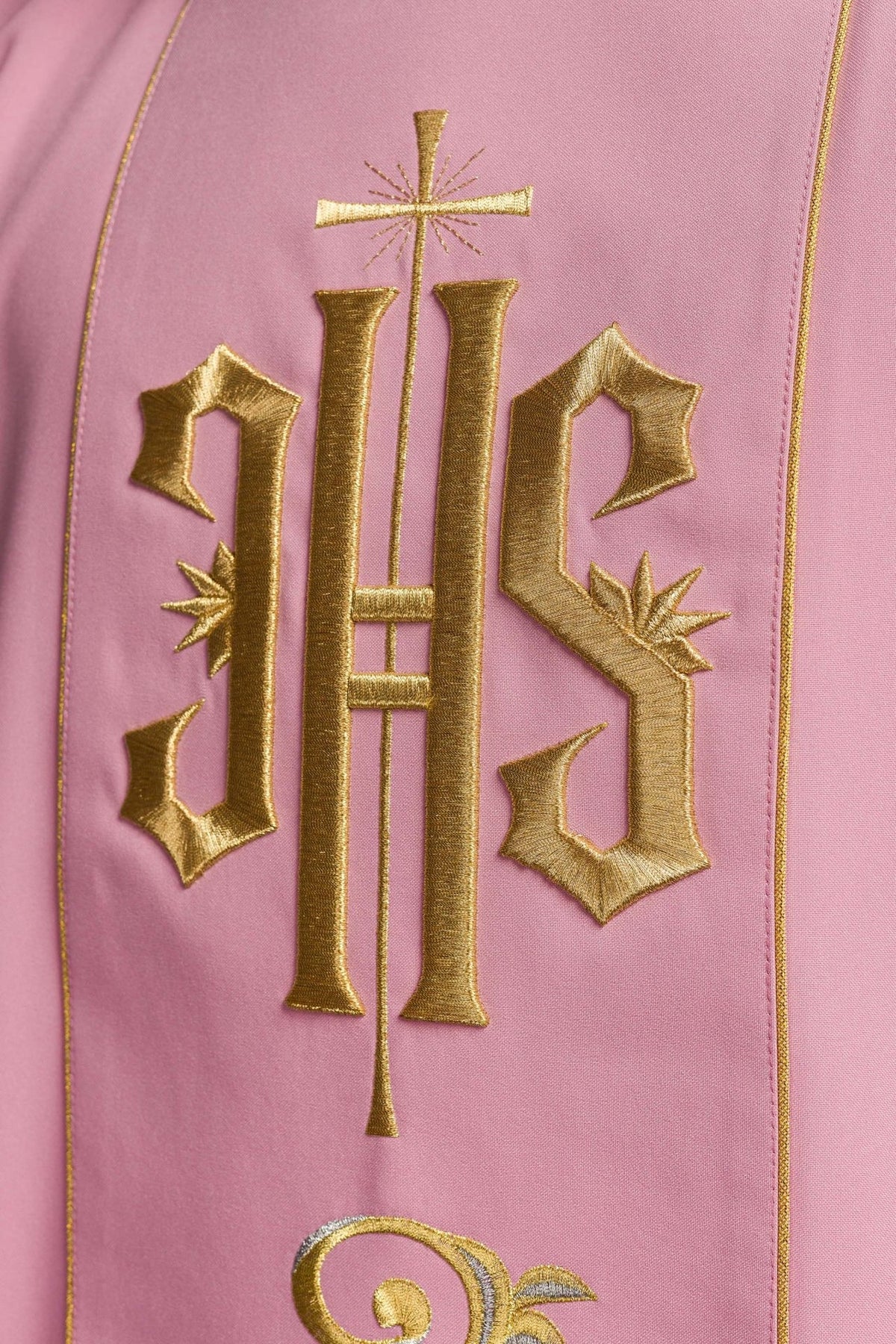 Rose dalmatic close-up of gold embroidered IHS orphrey