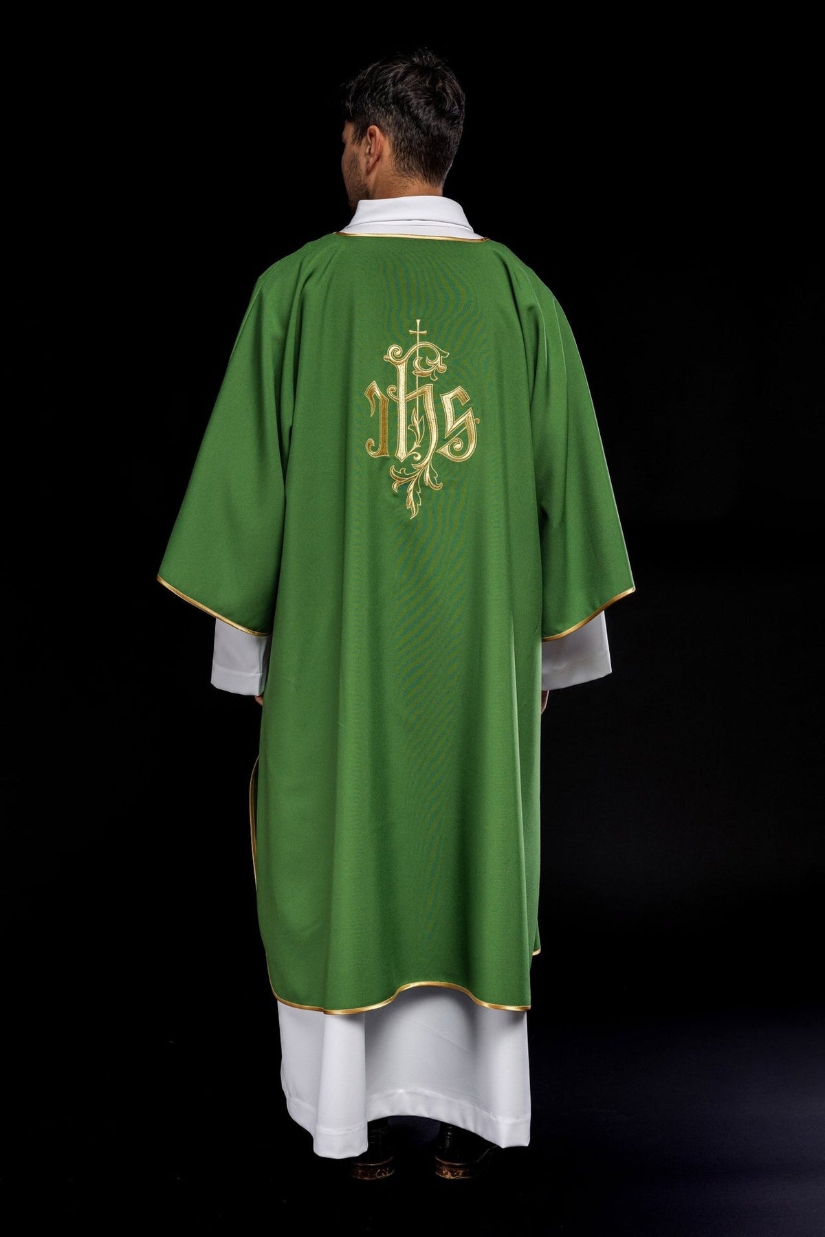 Green dalmatic full back view with gold IHS embroidery and trim