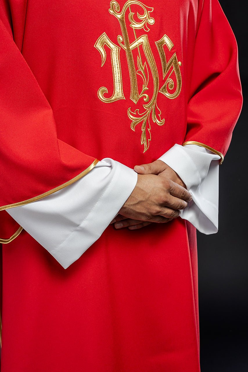Red dalmatic, close-up of gold embroidered IHS design and sleeve trim