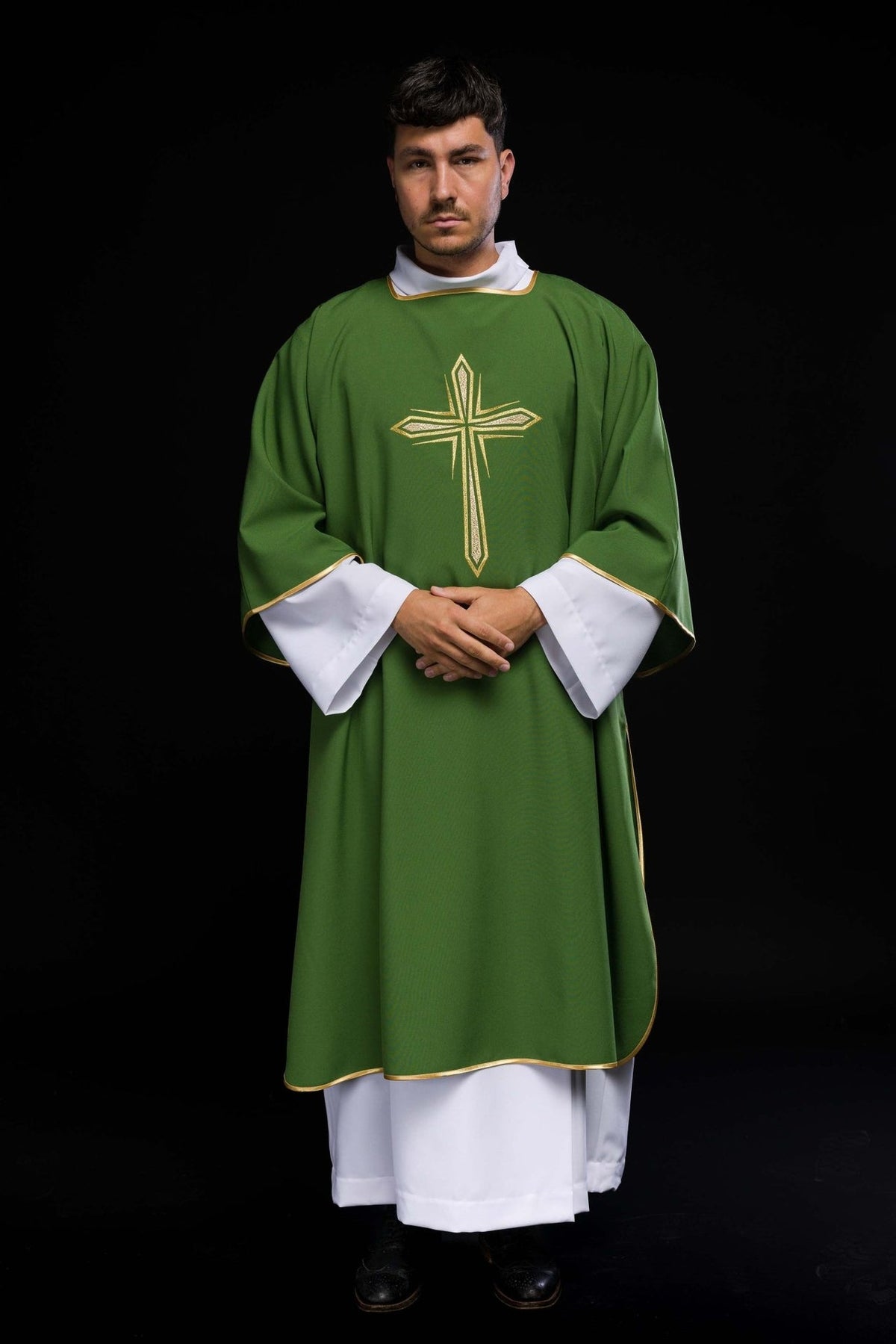 Green dalmatic with embroidered gold cross, full front view