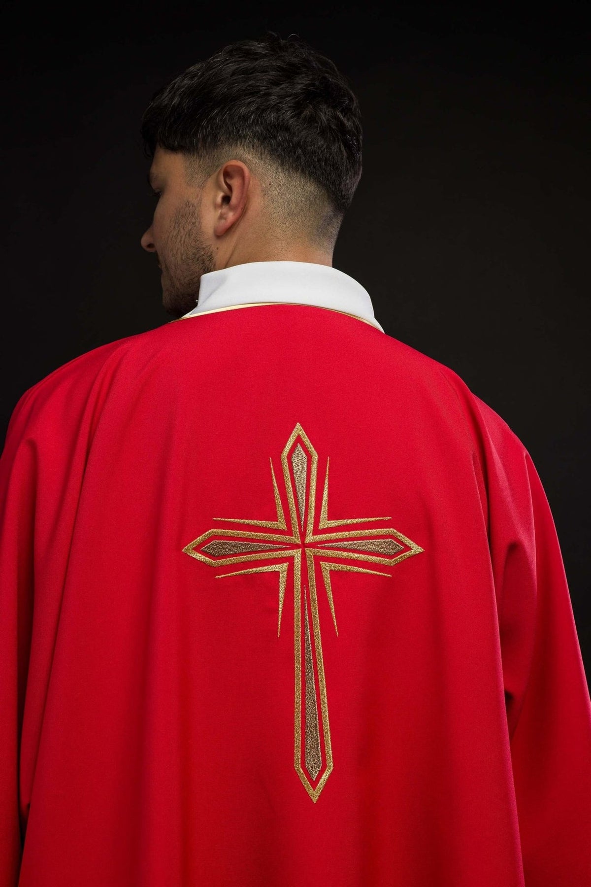 Red dalmatic back view with embroidered gold cross
