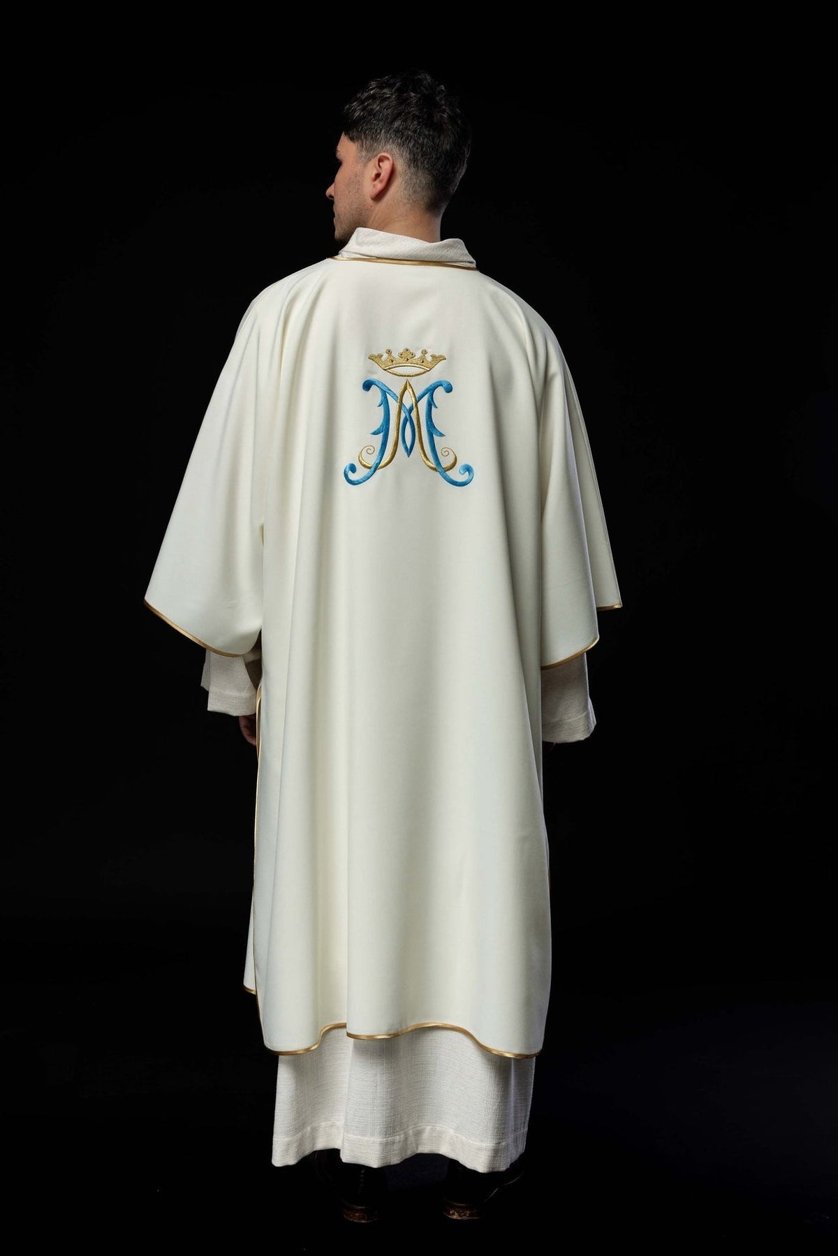 Ecru dalmatic full back view with blue and gold Marian embroidery