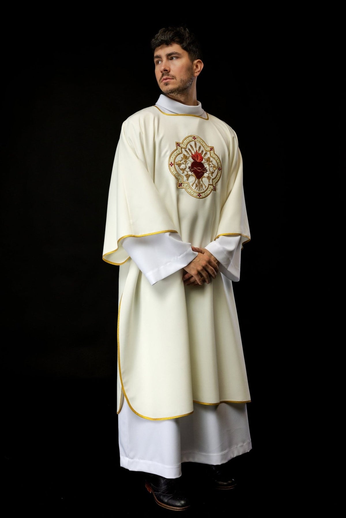 Ecru dalmatic front view with Sacred Heart of Jesus embroidery and gold trim