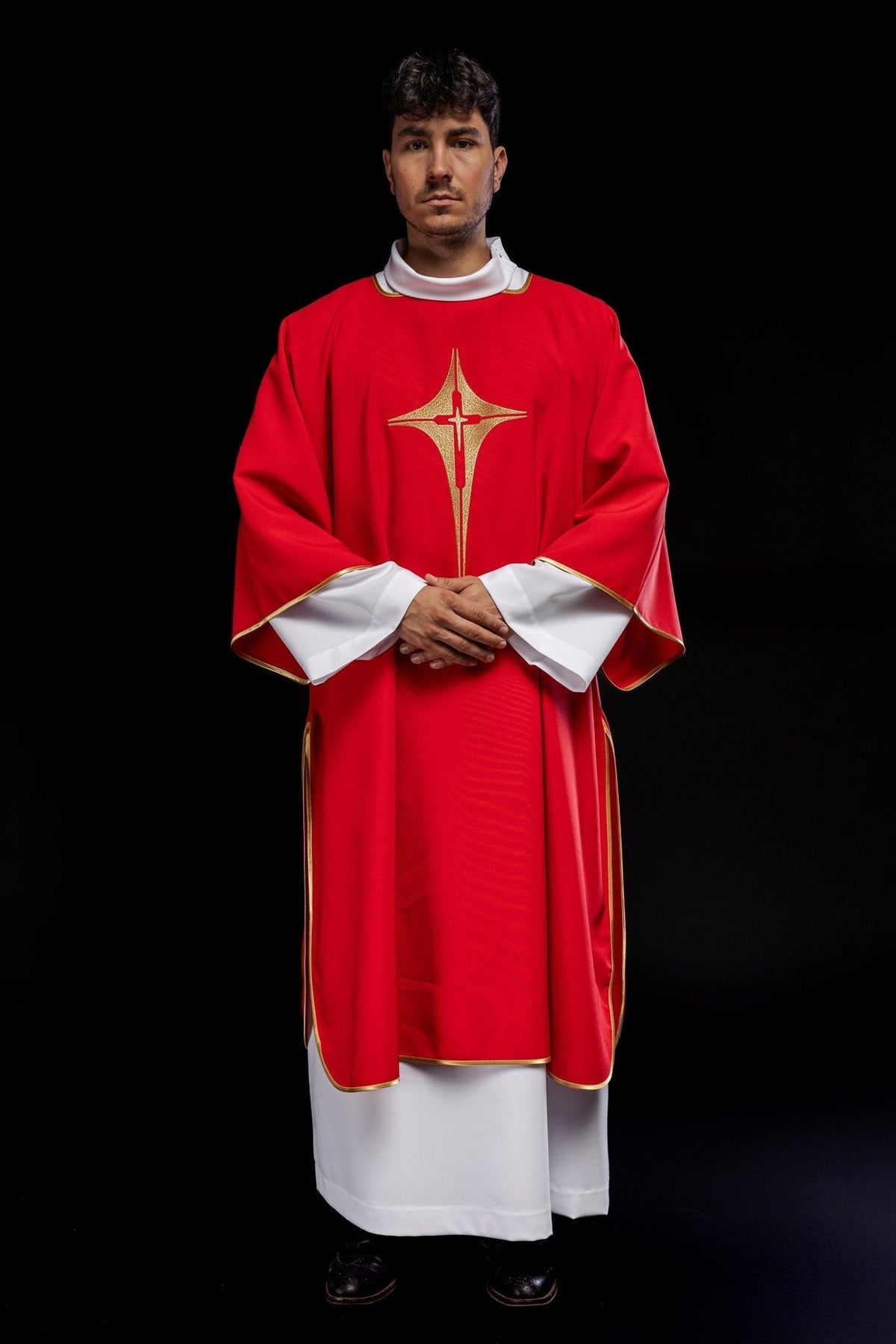 Red dalmatic front view with embroidered gold cross and gold trim