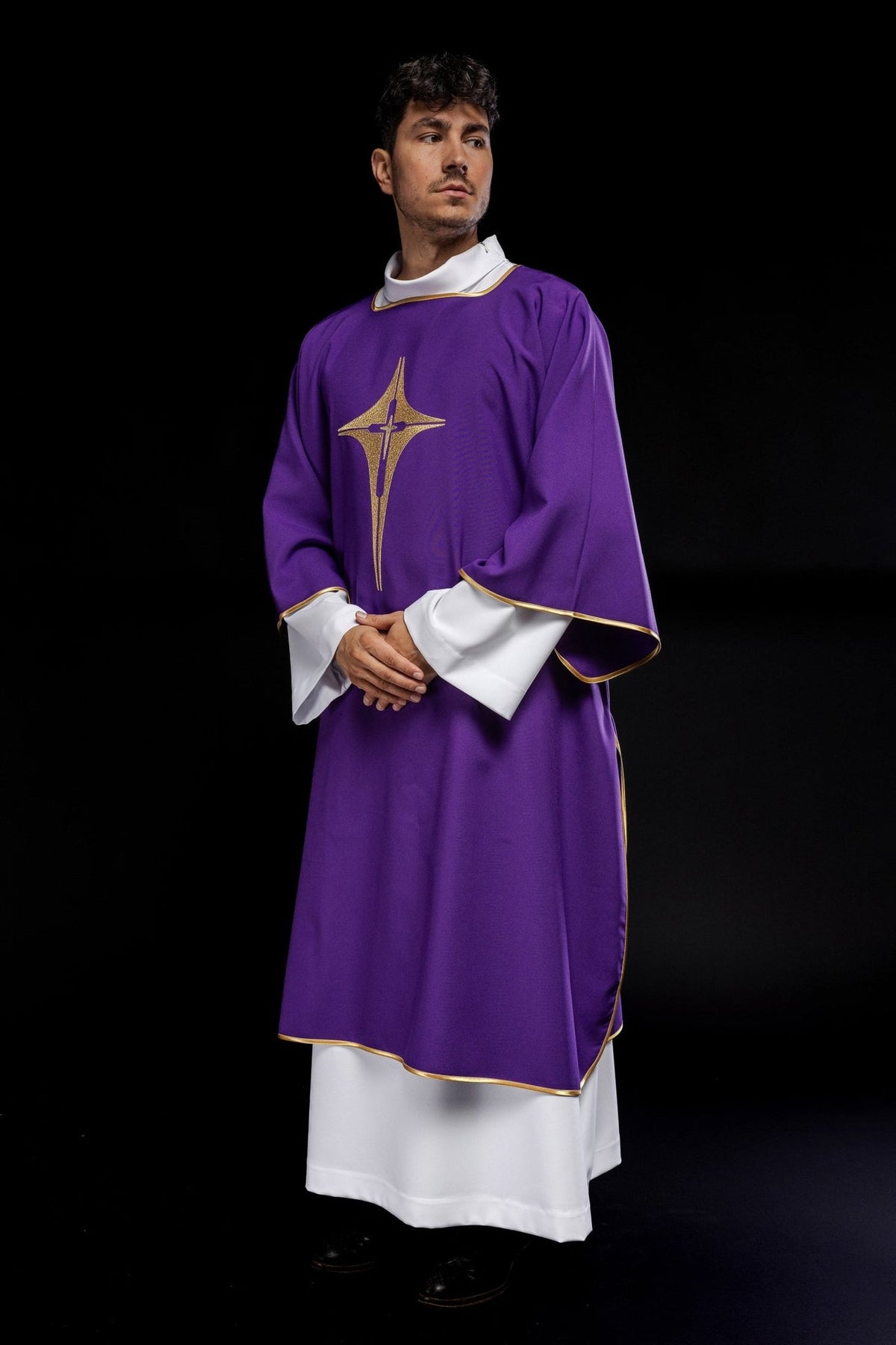 Purple dalmatic front view with embroidered gold cross and gold trim