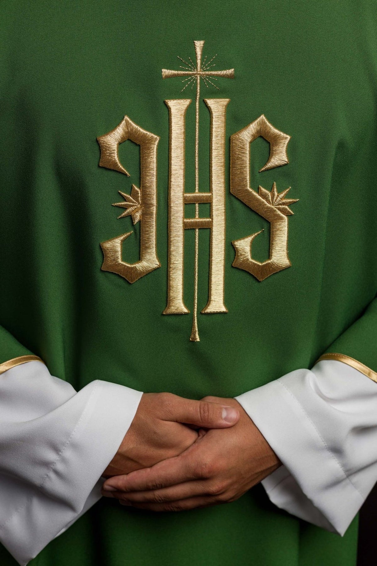 Green dalmatic front close-up with detailed gold IHS embroidery