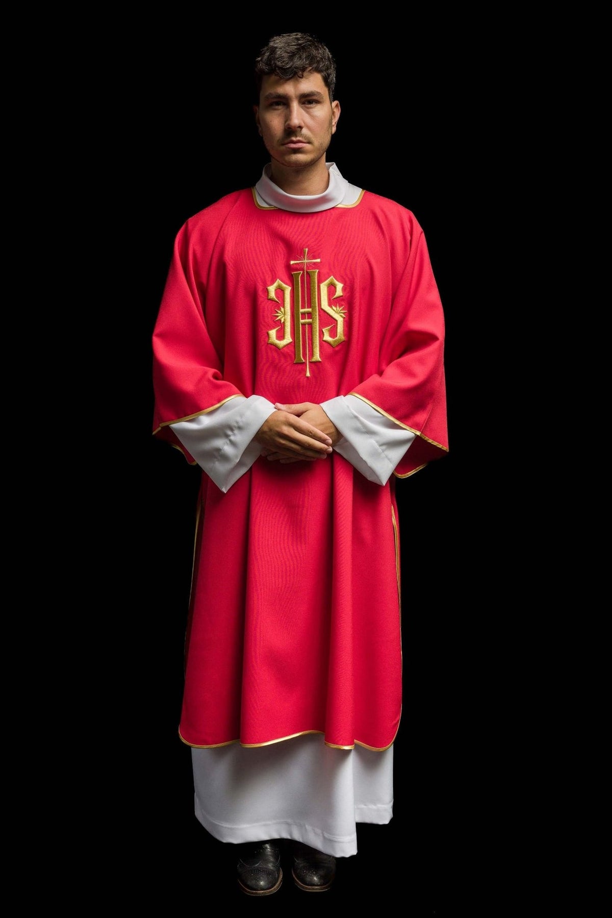 Red dalmatic with gold-embroidered IHS, full front view