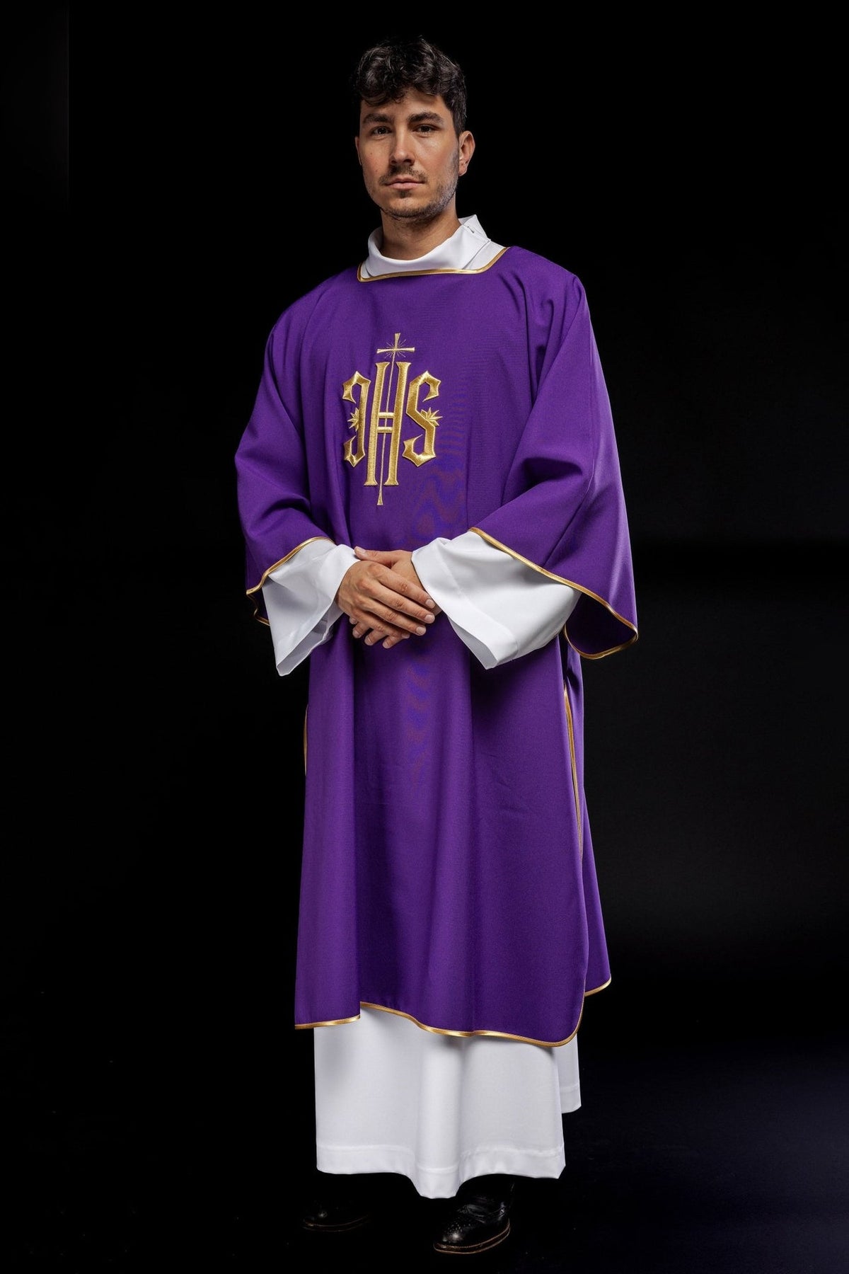 Purple dalmatic front view with embroidered gold IHS and gold trim