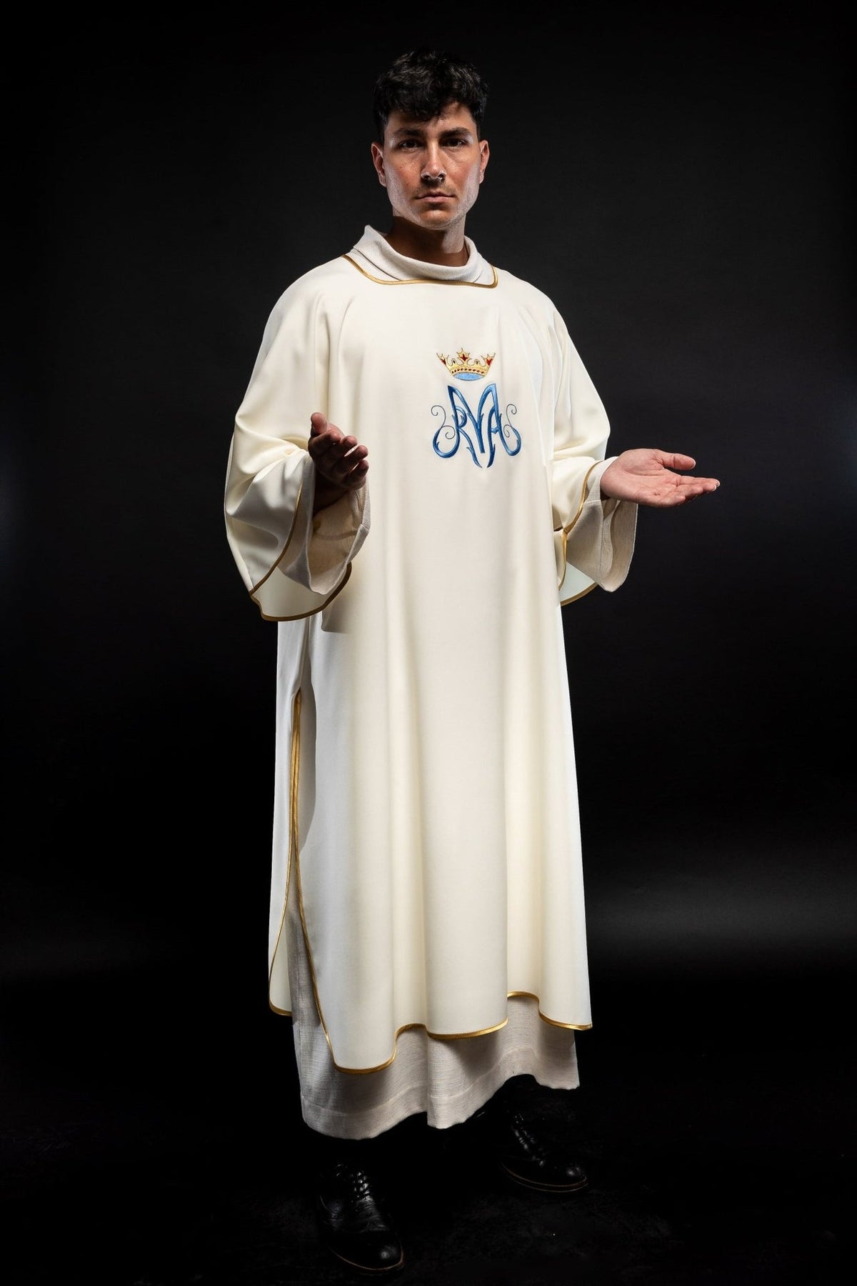 Dalmatic front view with wide sleeves, gold trim and blue Marian embroidery