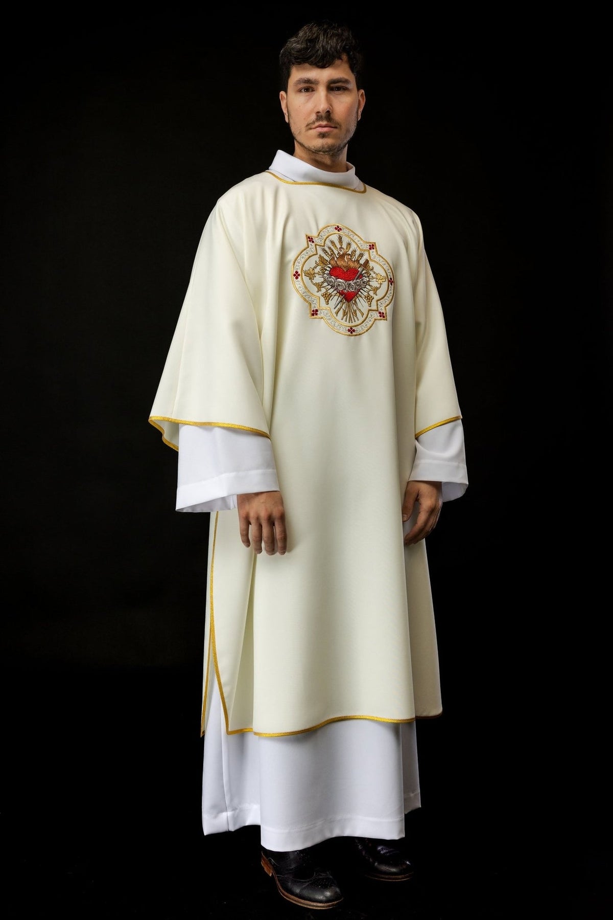 Ecru dalmatic with Heart of Mary embroidery and gold trim, full front view