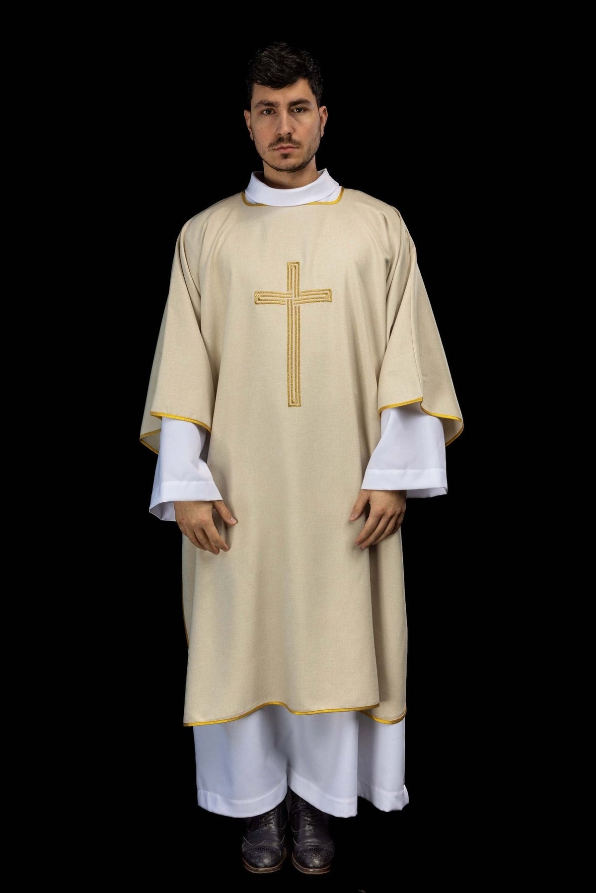 Ecru Catholic dalmatic worn full length from the front