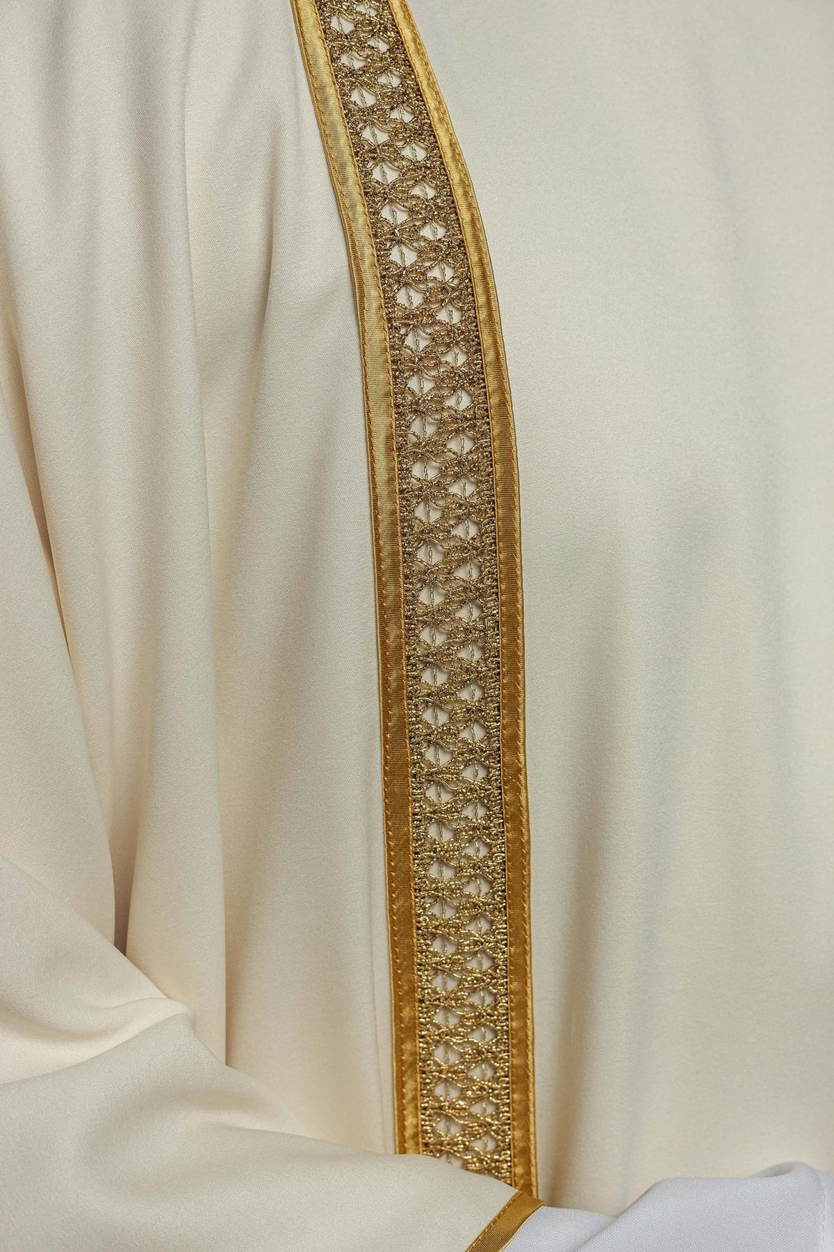 Ecru dalmatic gold orphrey embroidery close-up