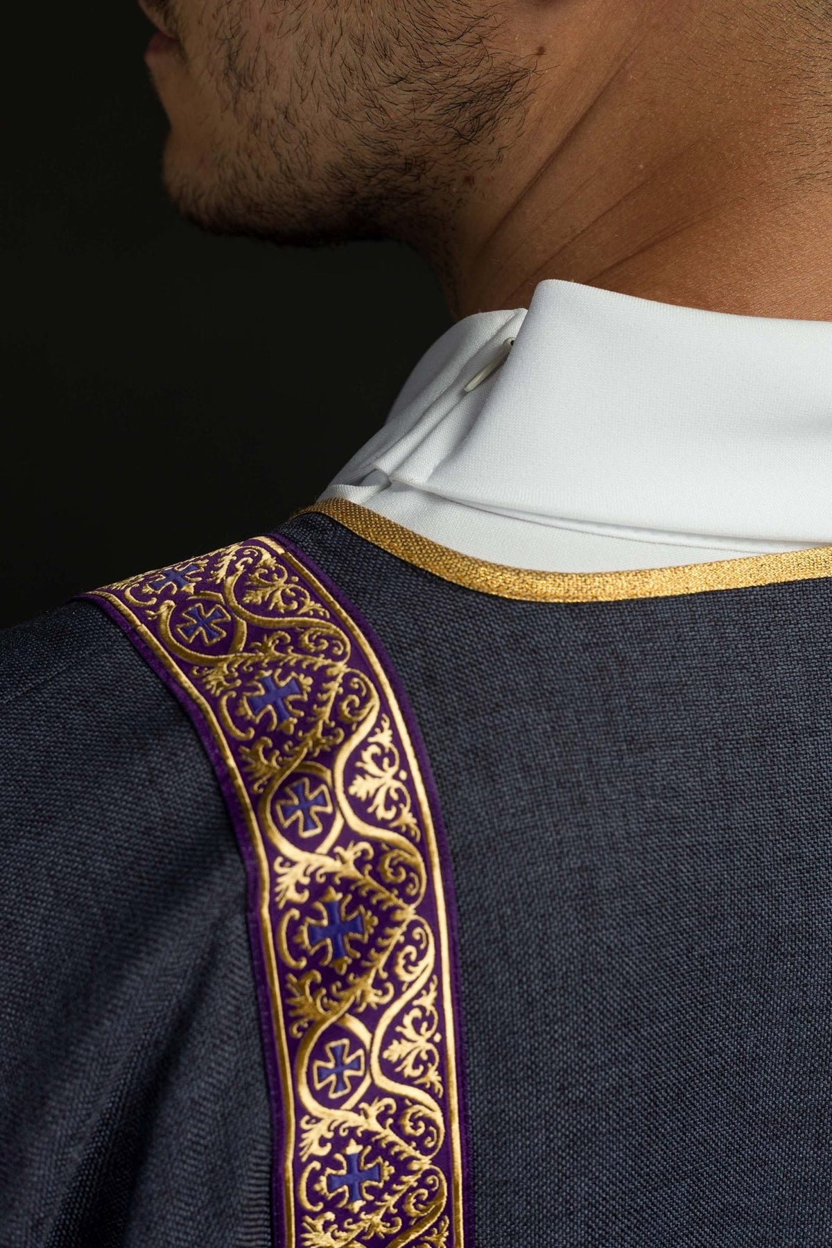 Purple dalmatic collar close-up with gold trim and jacquard orphrey