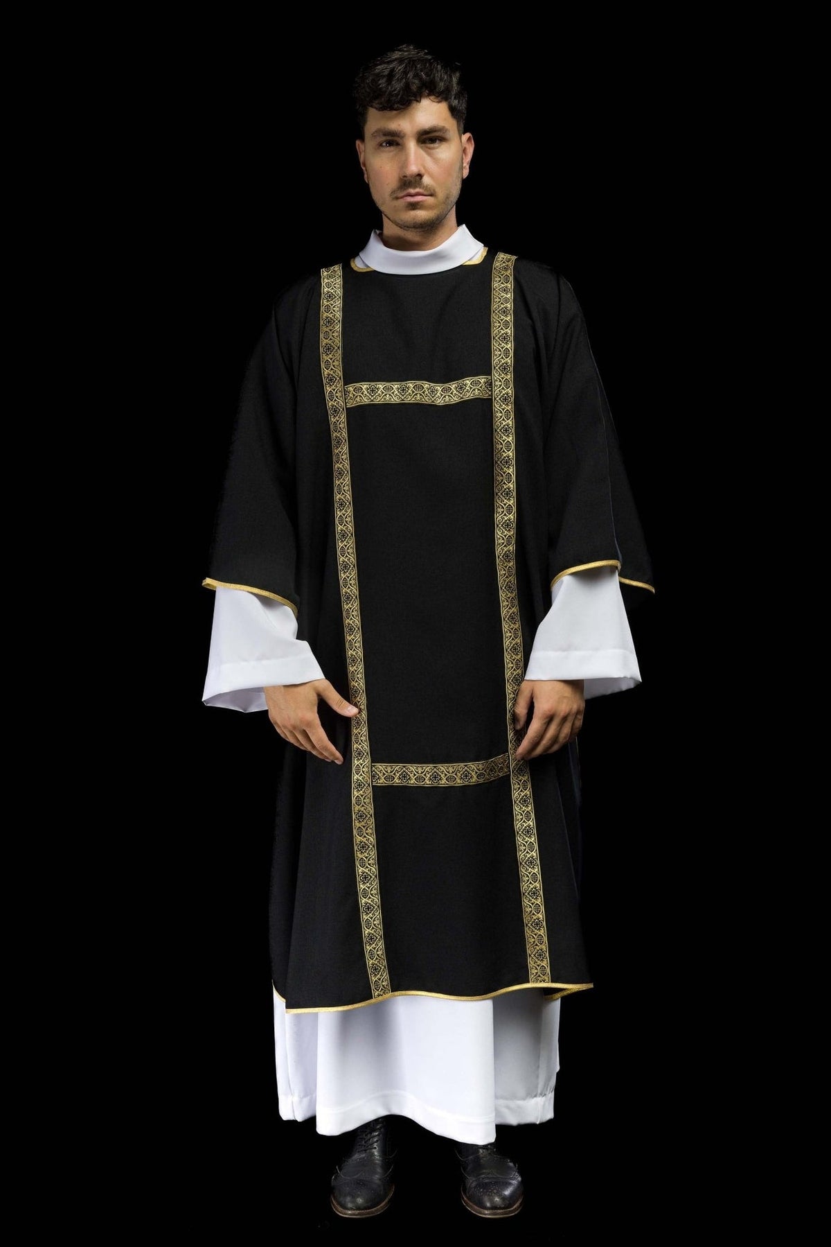Black dalmatic with gold jacquard orphreys, full front view