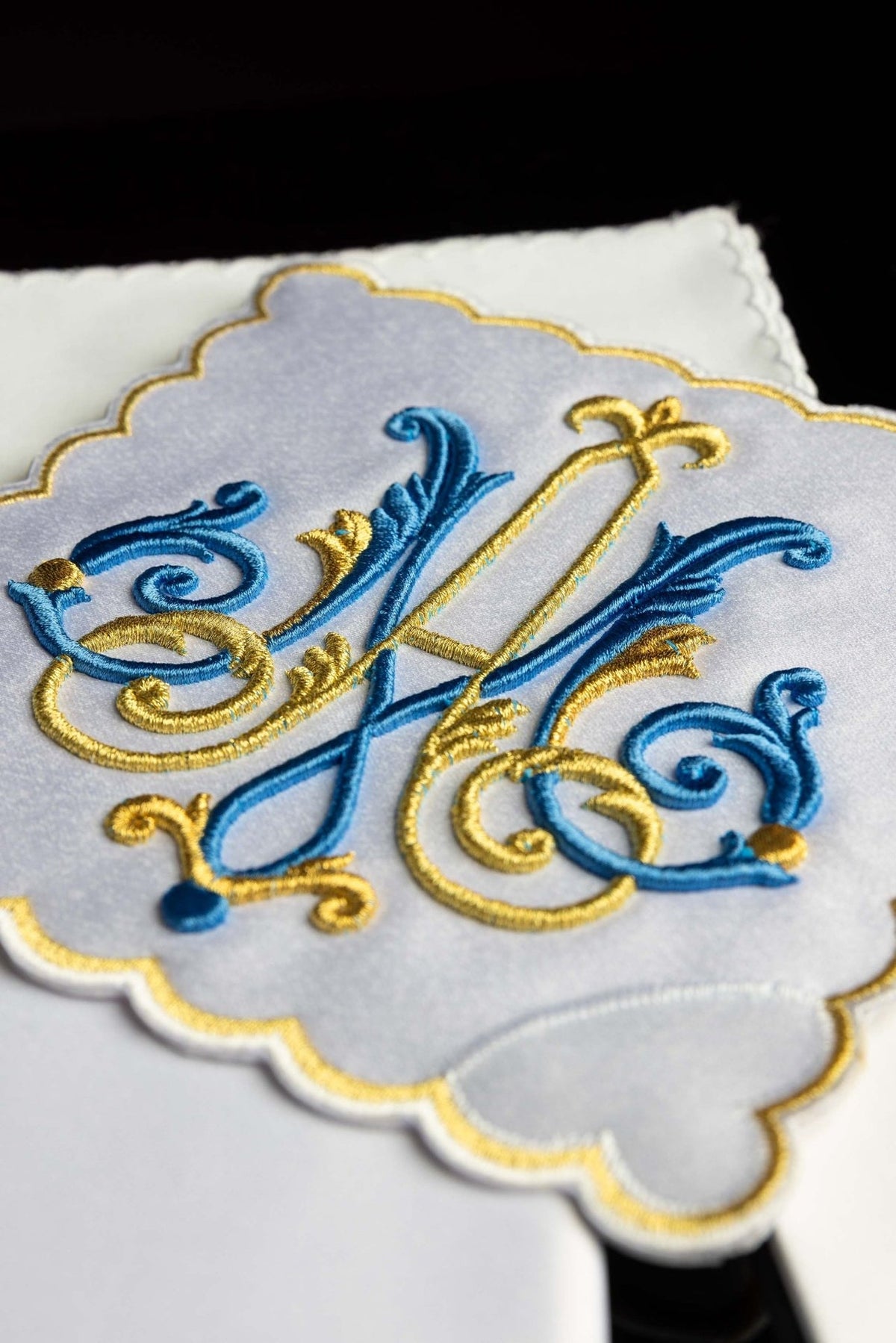Altar linen set close-up of blue and gold Marian motif with scalloped border