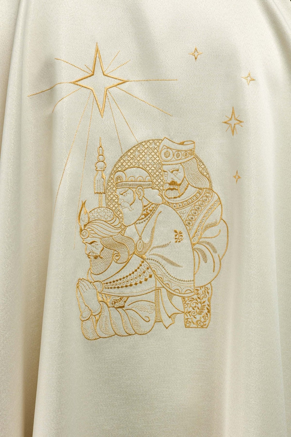 Epiphany chasuble, close-up of embroidered gold star and three figures