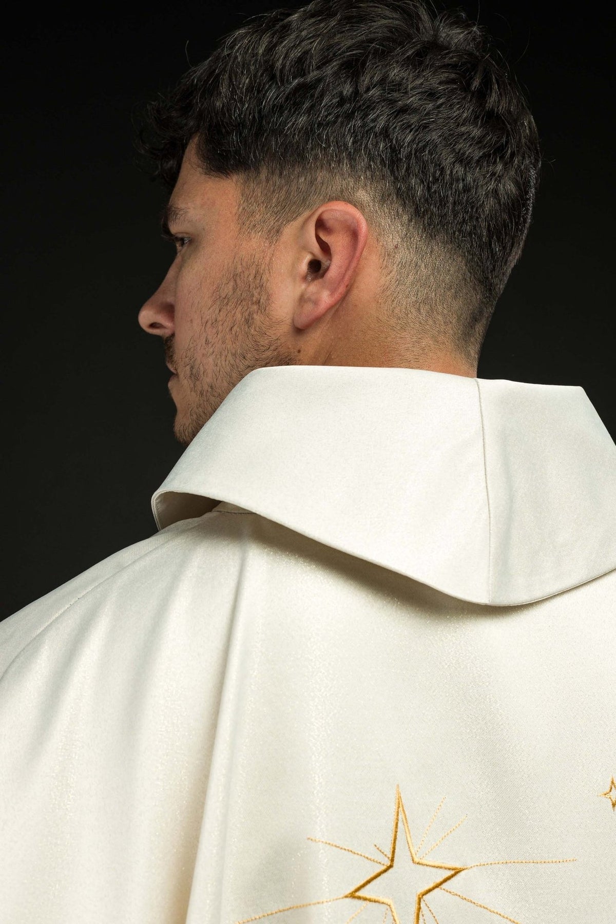 Epiphany chasuble, side close-up showing ivory stand-up collar and shimmering fabric