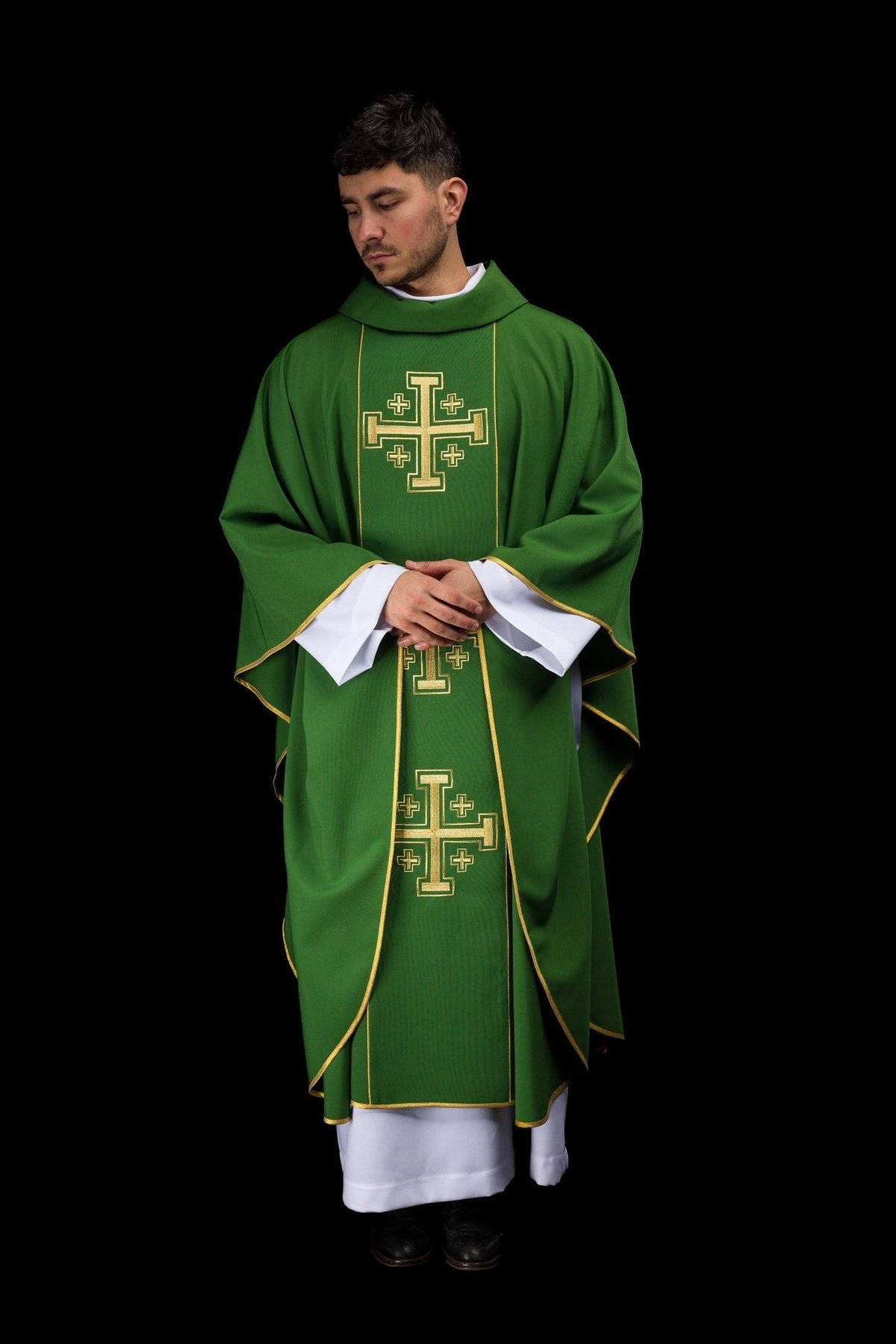 Green chasuble worn from the front with gold embroidered Jerusalem crosses
