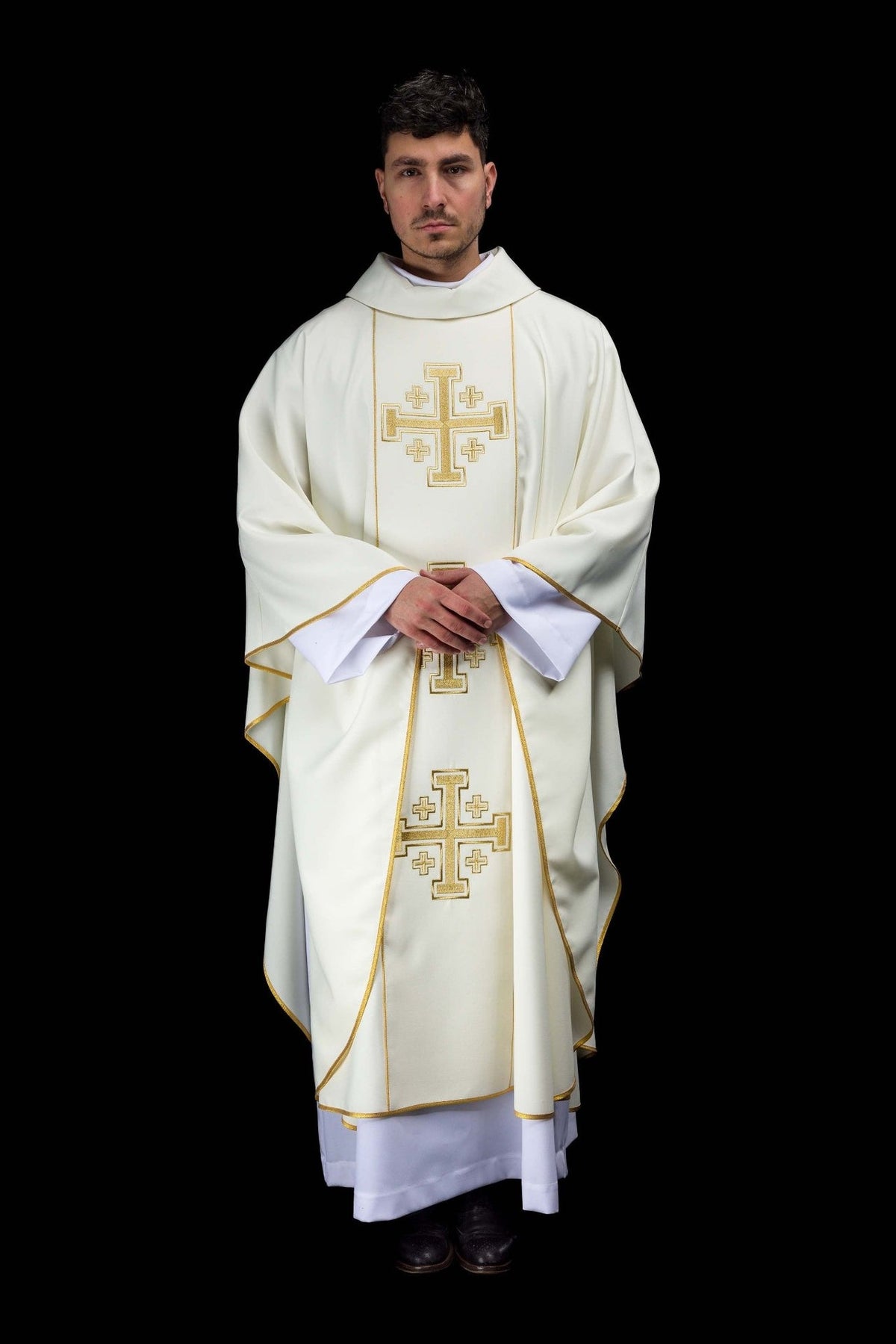 Ecru chasuble worn from the front with gold trim and Jerusalem cross orphrey