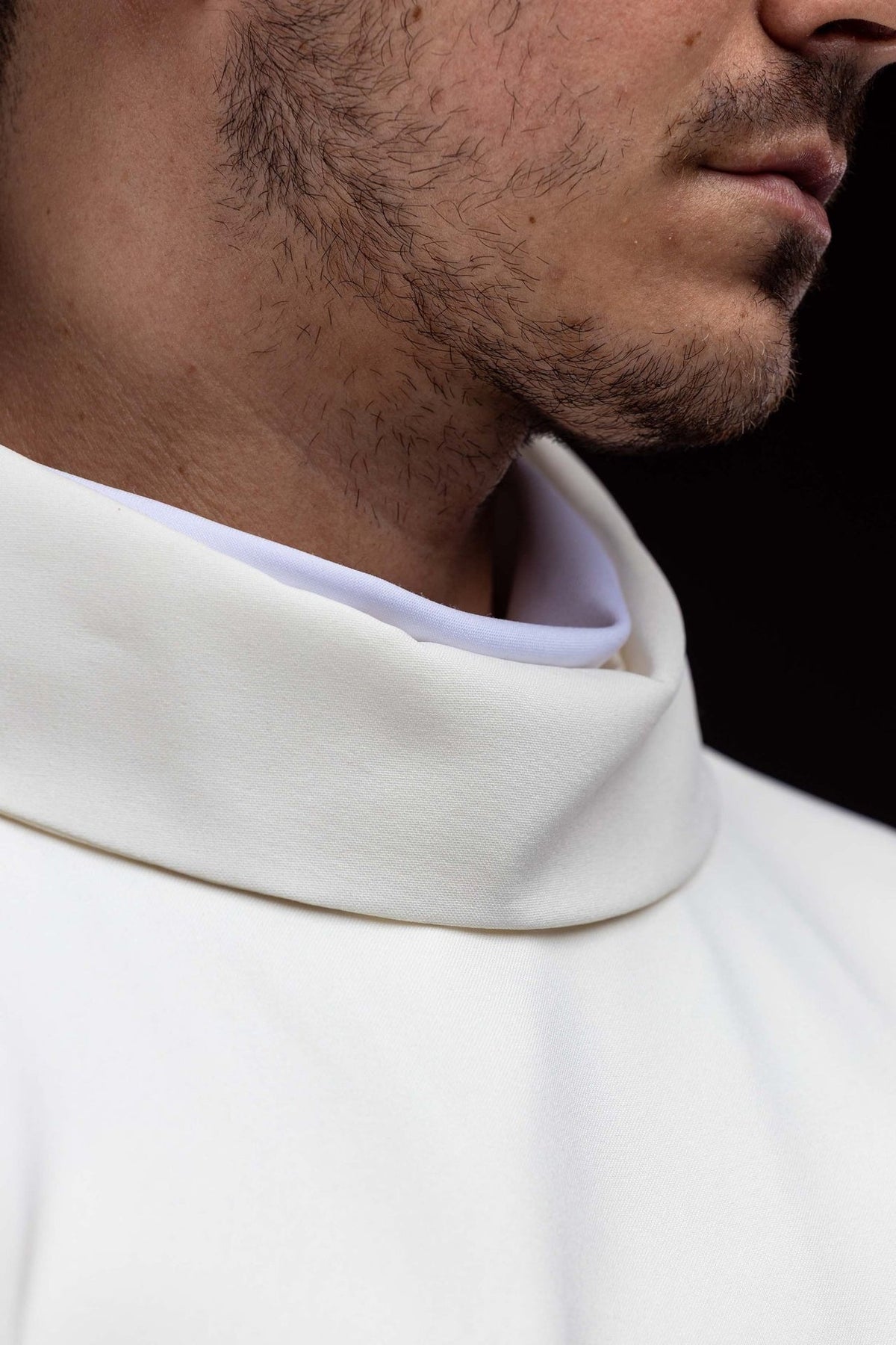 Marian chasuble side close-up with blue embroidered Marian motif and silver sleeve trim