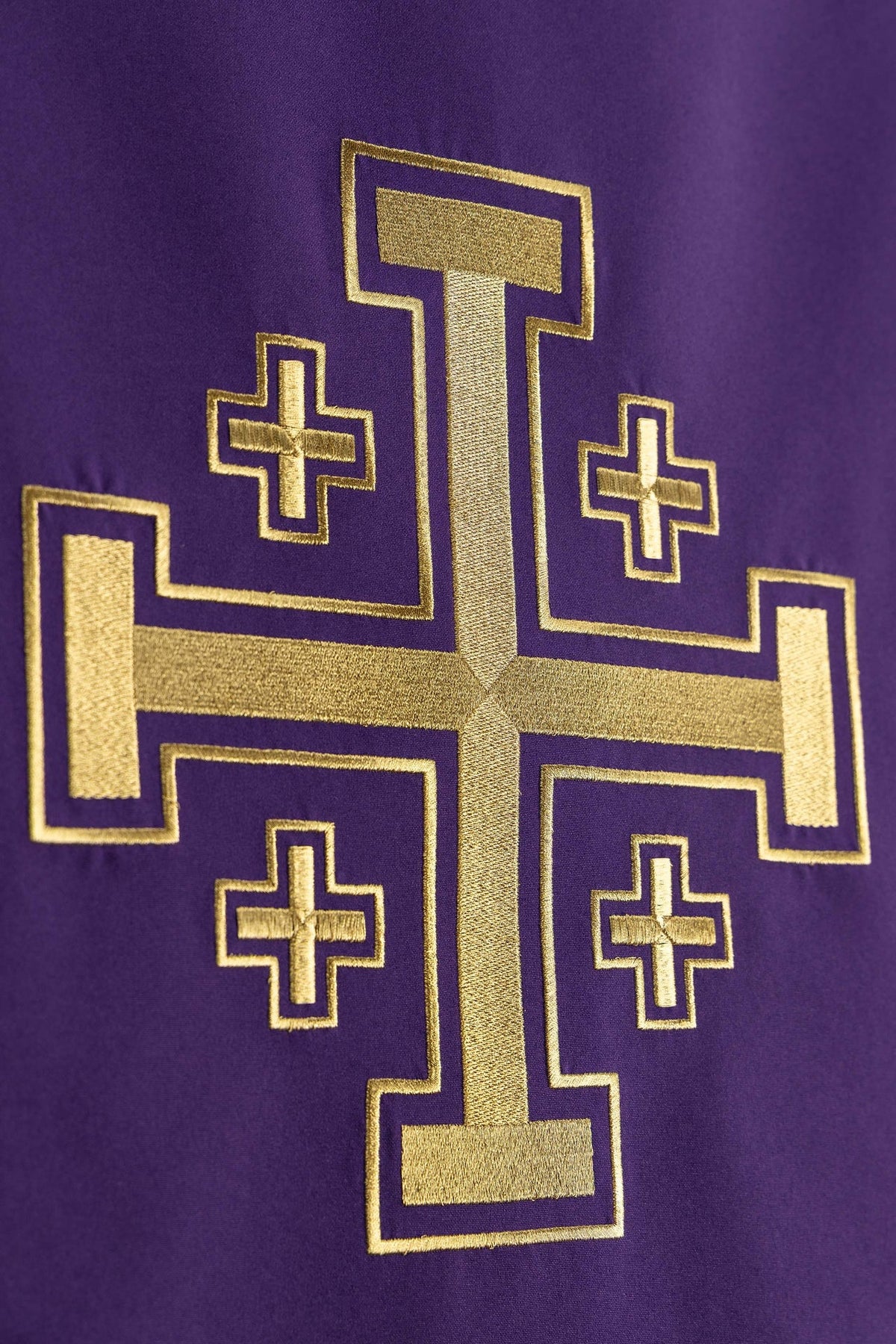 Church lectern cover close-up showing full Jerusalem cross embroidery