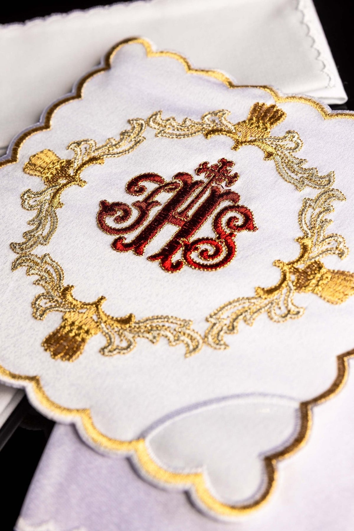 Altar linen set close-up of red IHS and ornate gold embroidery