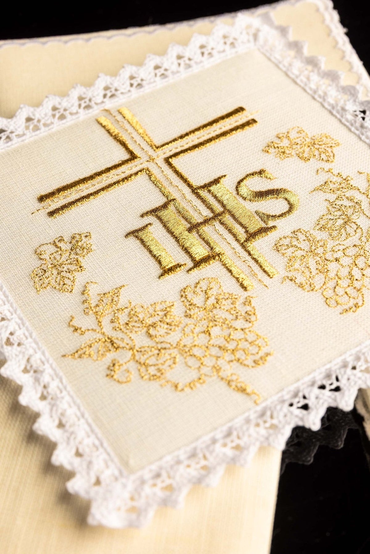 Altar linen set close-up showing gold cross, IHS and grape embroidery