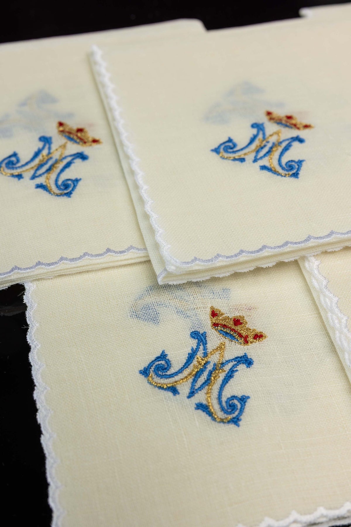 Linen corporals detail showing Marian motif and scalloped white edging