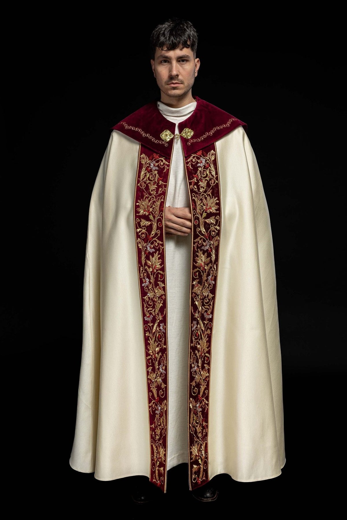 Ecru cope front view with burgundy embroidered stole panels and floral motifs
