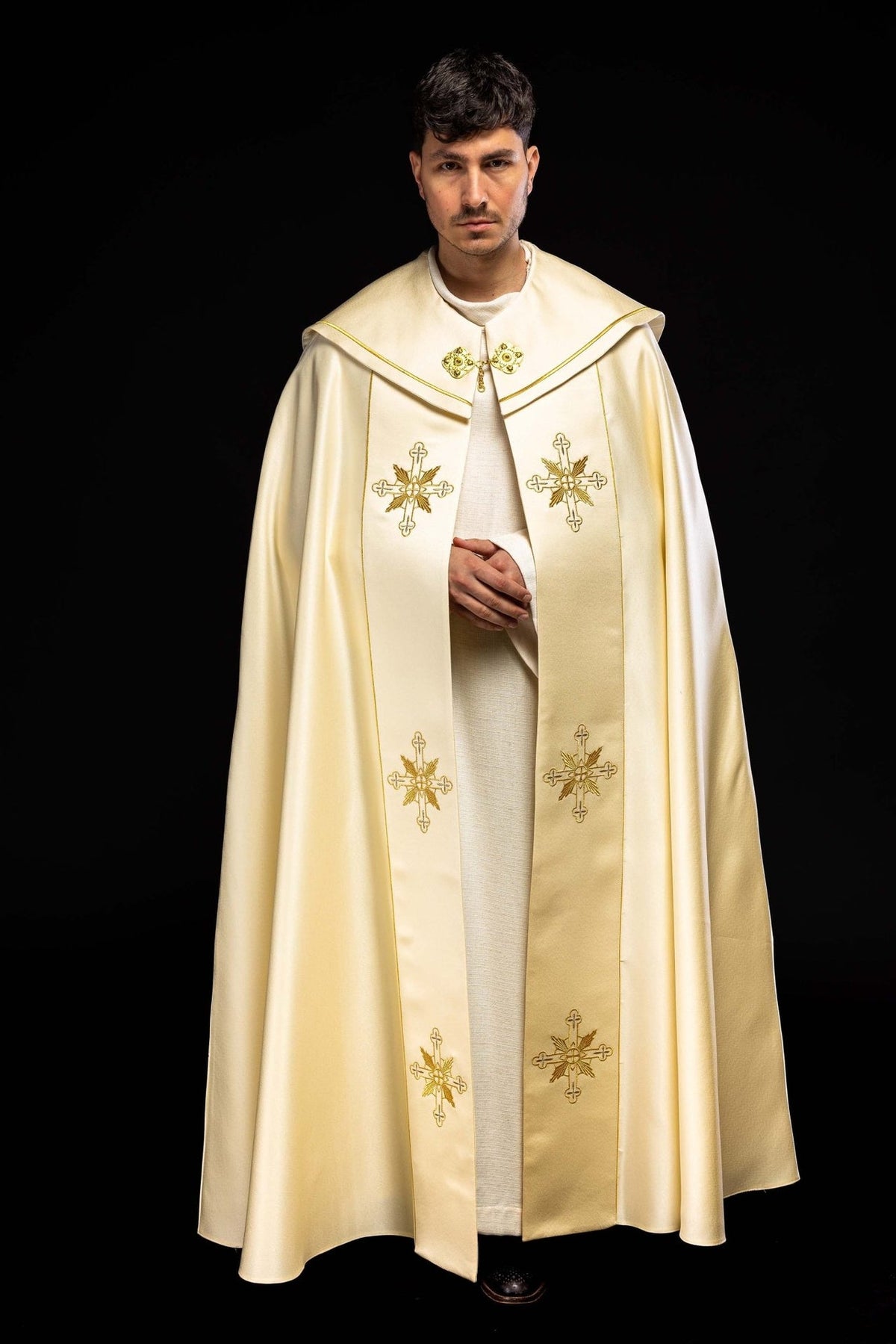 IHS monogram cope in ivory satin, front view with gold cross embroidery and matching stole panels