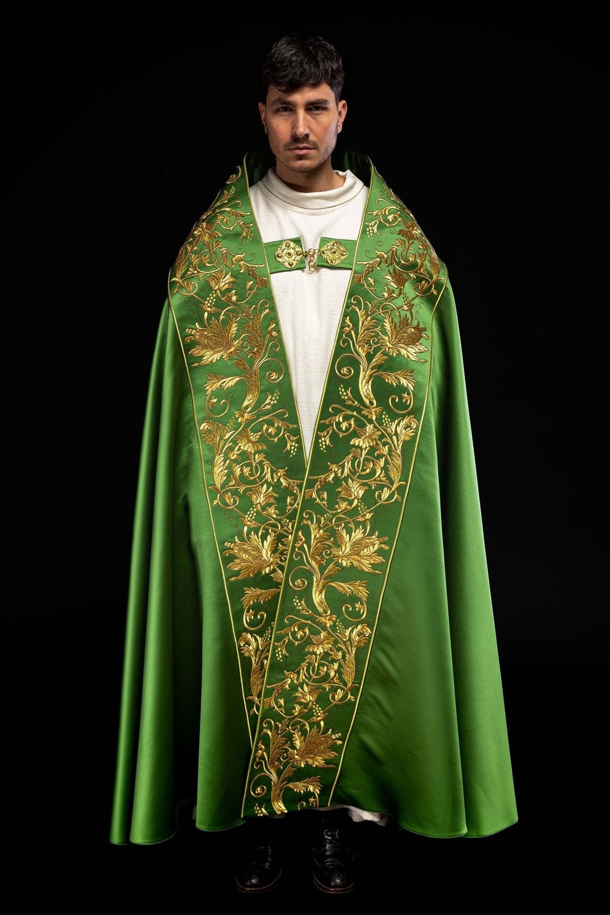 Green satin cope, front view with ornate gold embroidery
