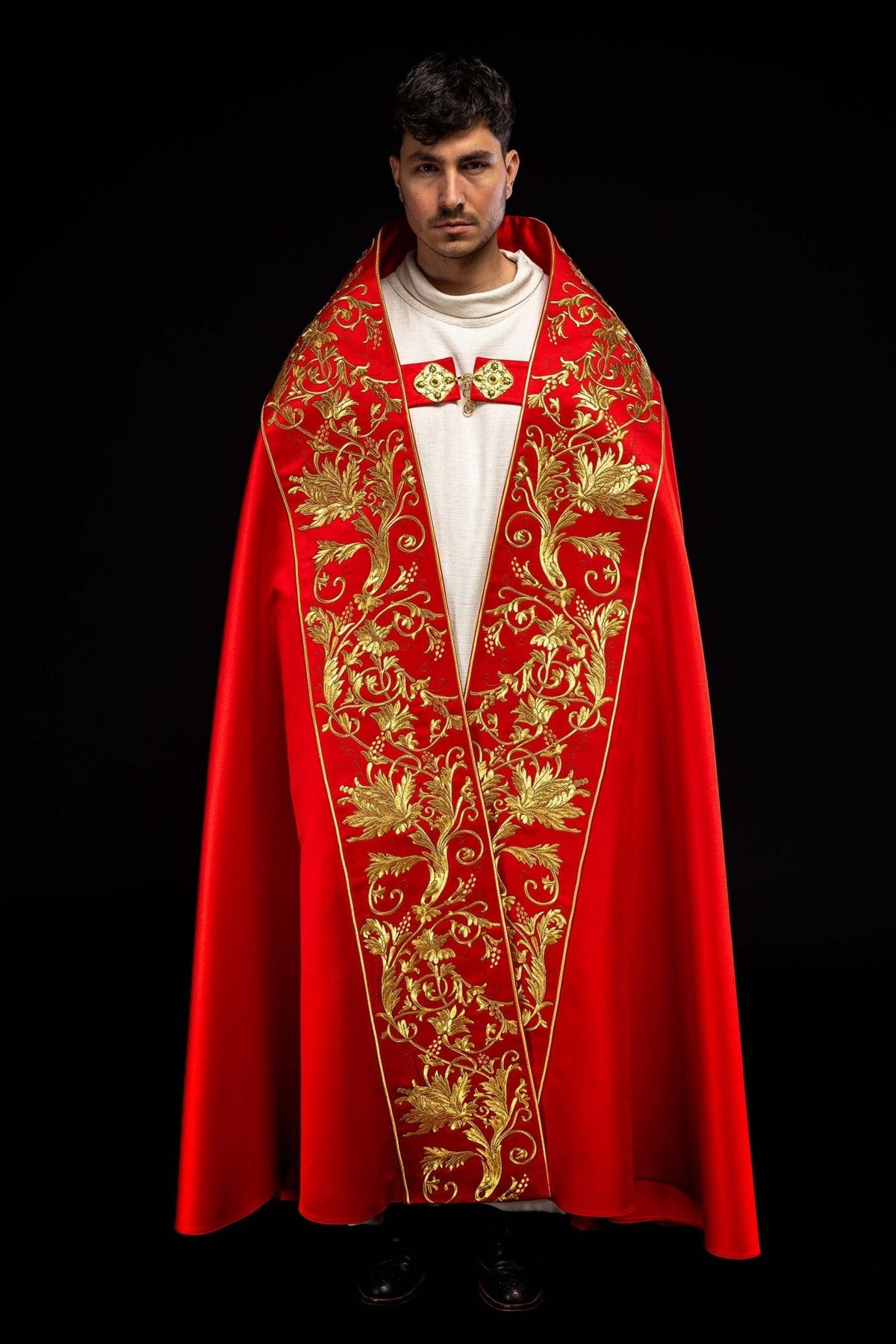 Red satin cope, front view with embroidered gold floral panels