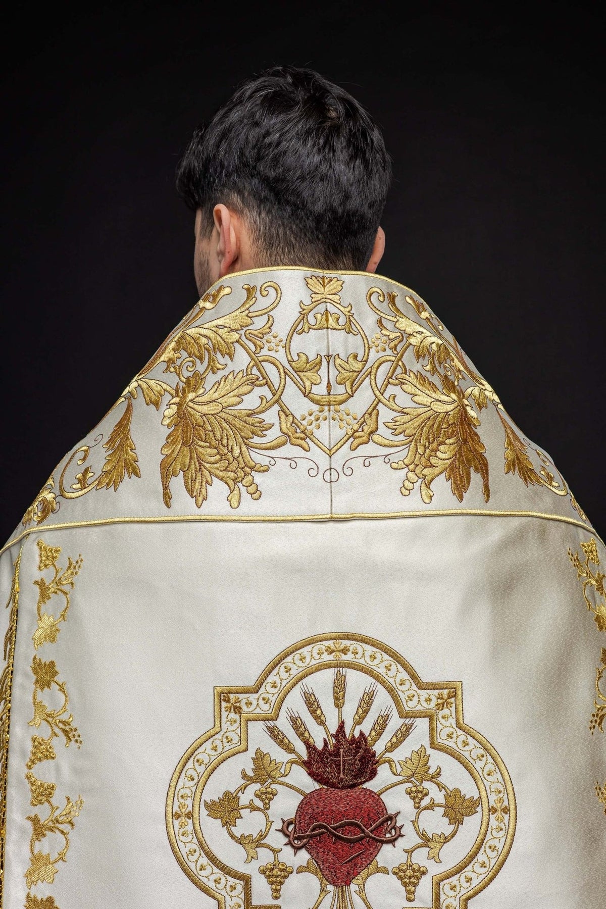 Ecru satin Roman cope, back view with gold embroidery and Sacred Heart of Jesus motif