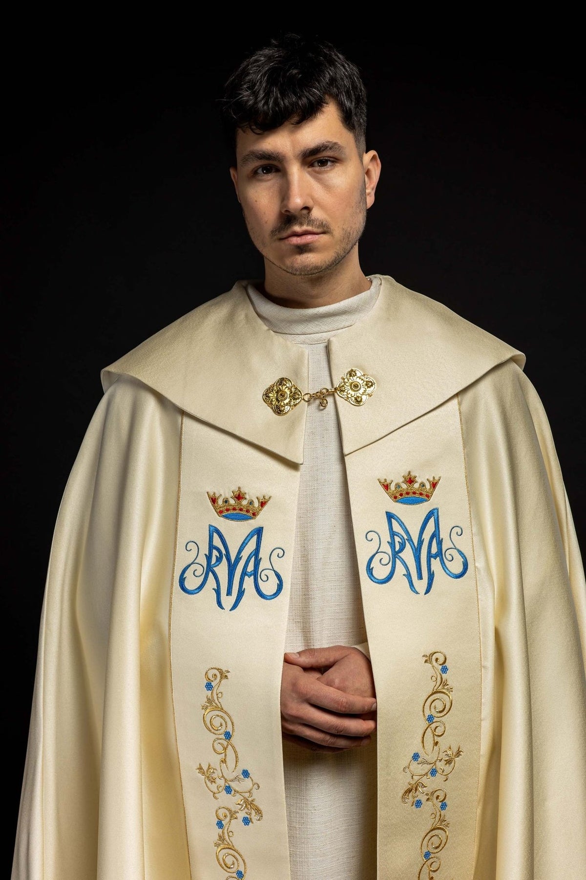 Marian cope, upper front view with ecru fabric, embroidered monograms and floral motifs