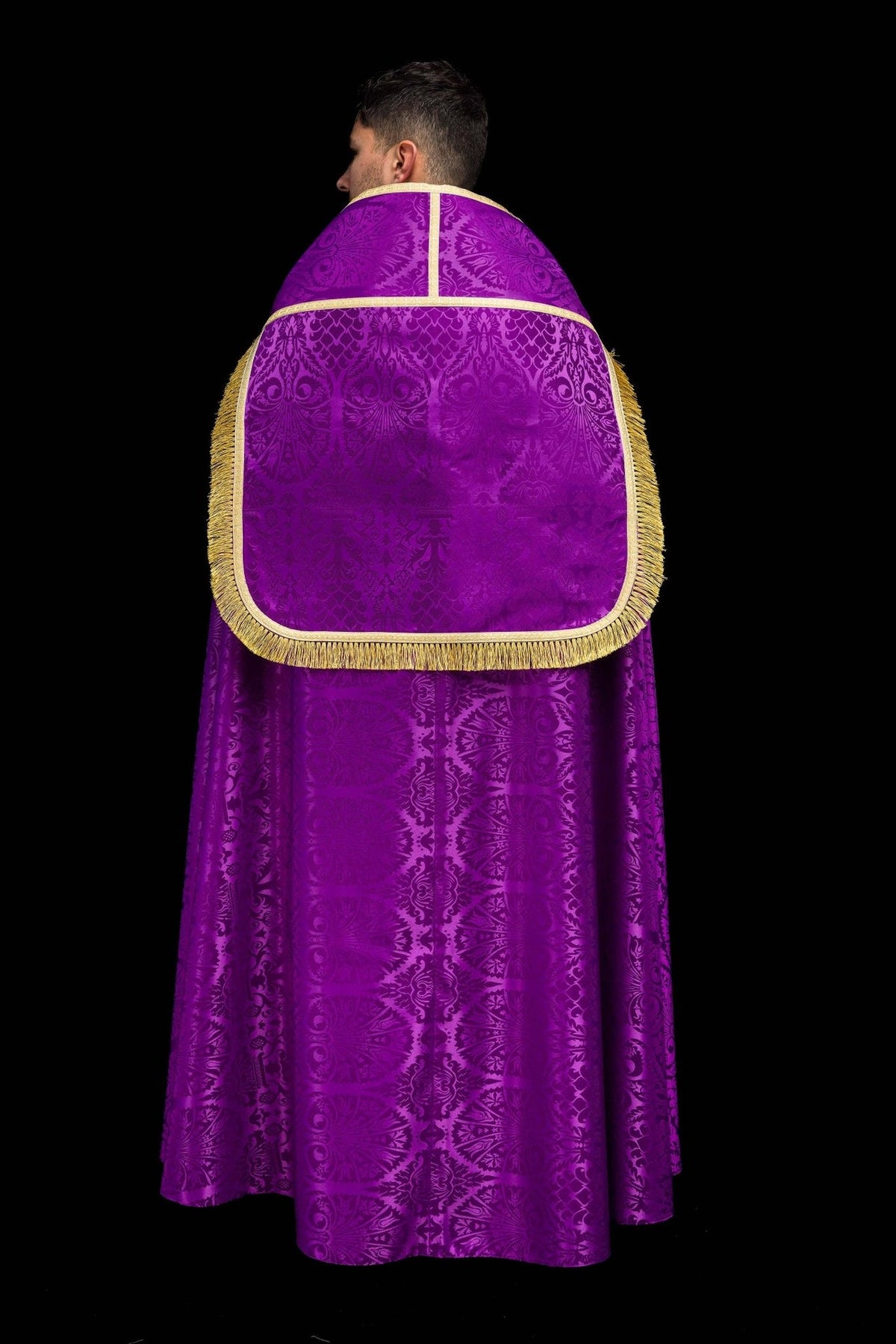 Roman cope back view with purple jacquard pattern, gold trim and fringe