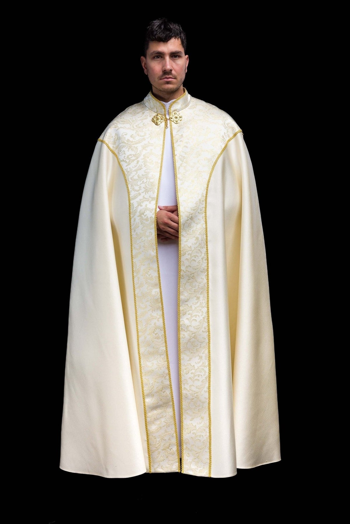 Ecru cope front view with jacquard fabric decoration and gold trim