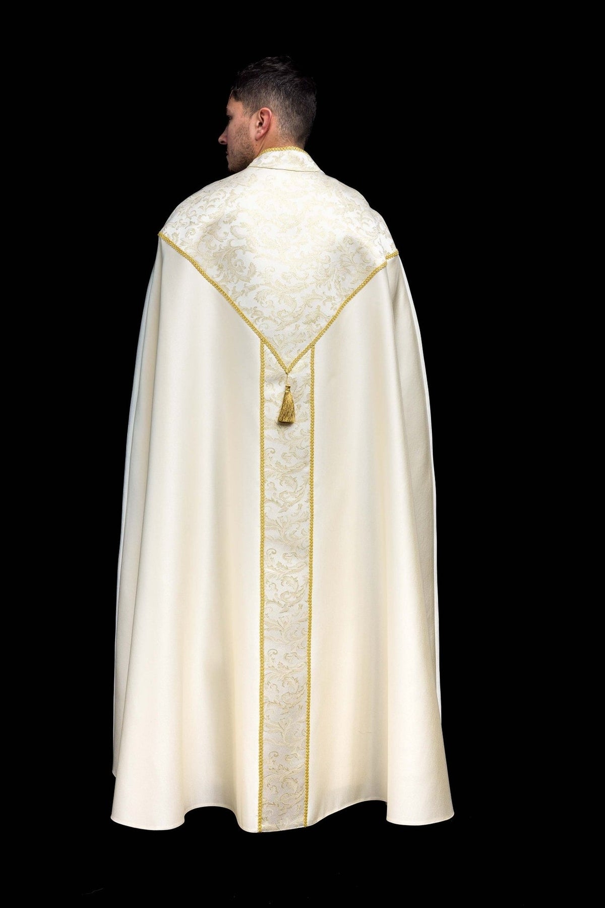 Ecru cope full back view with jacquard fabric decoration and gold trim