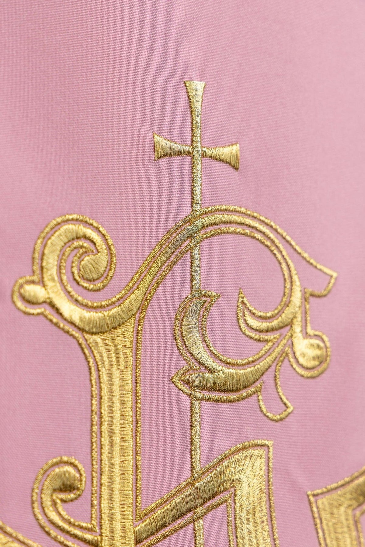 Rose church lectern cover close-up of embroidered cross and IHS details