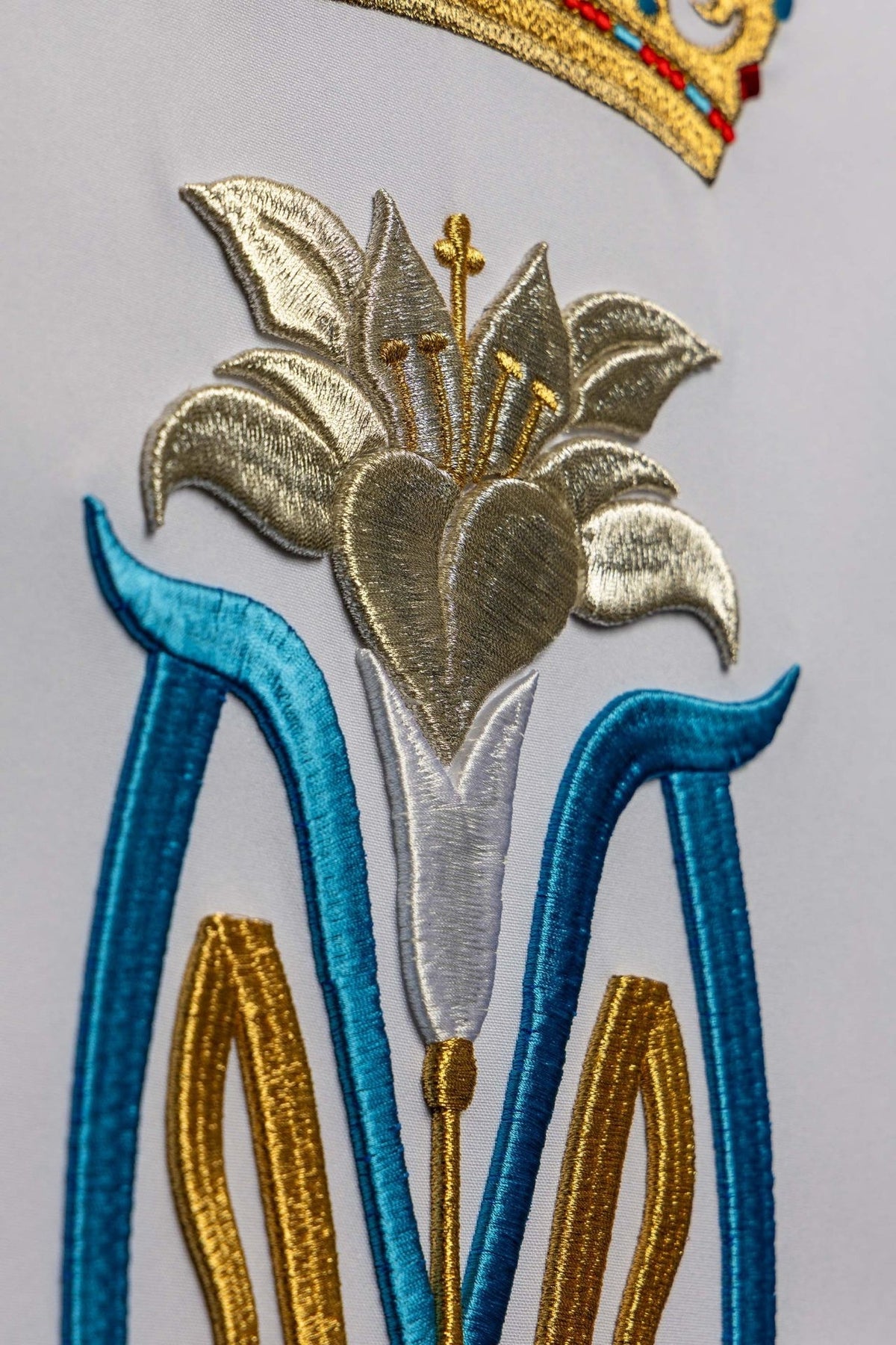Church lectern cover close-up of the silver lily embroidery